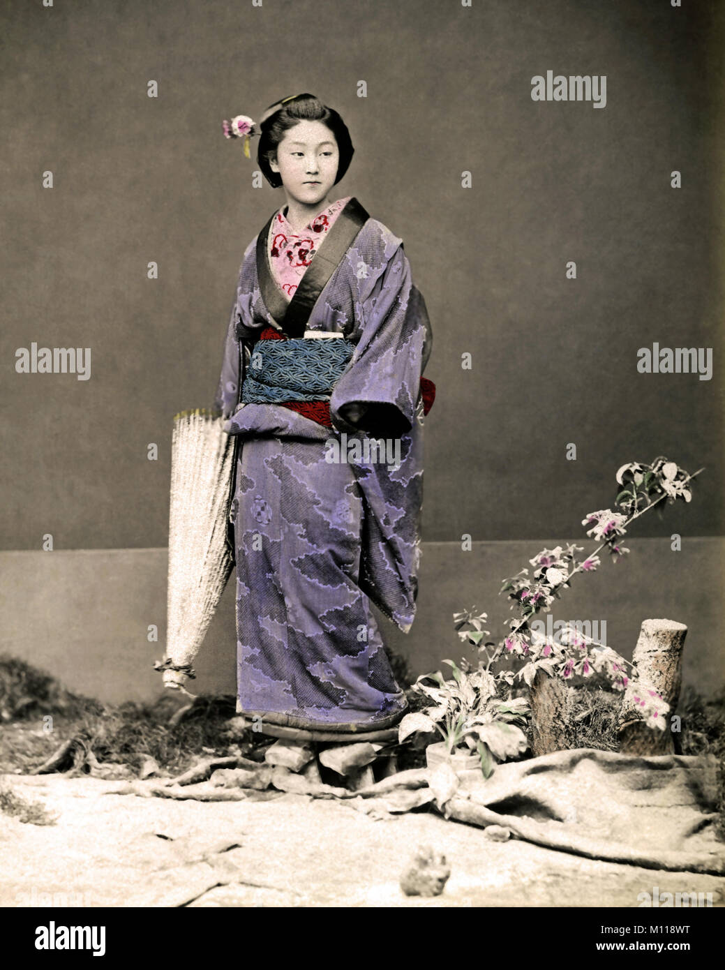 Geisha avec parapluie Japon Banque D'Images