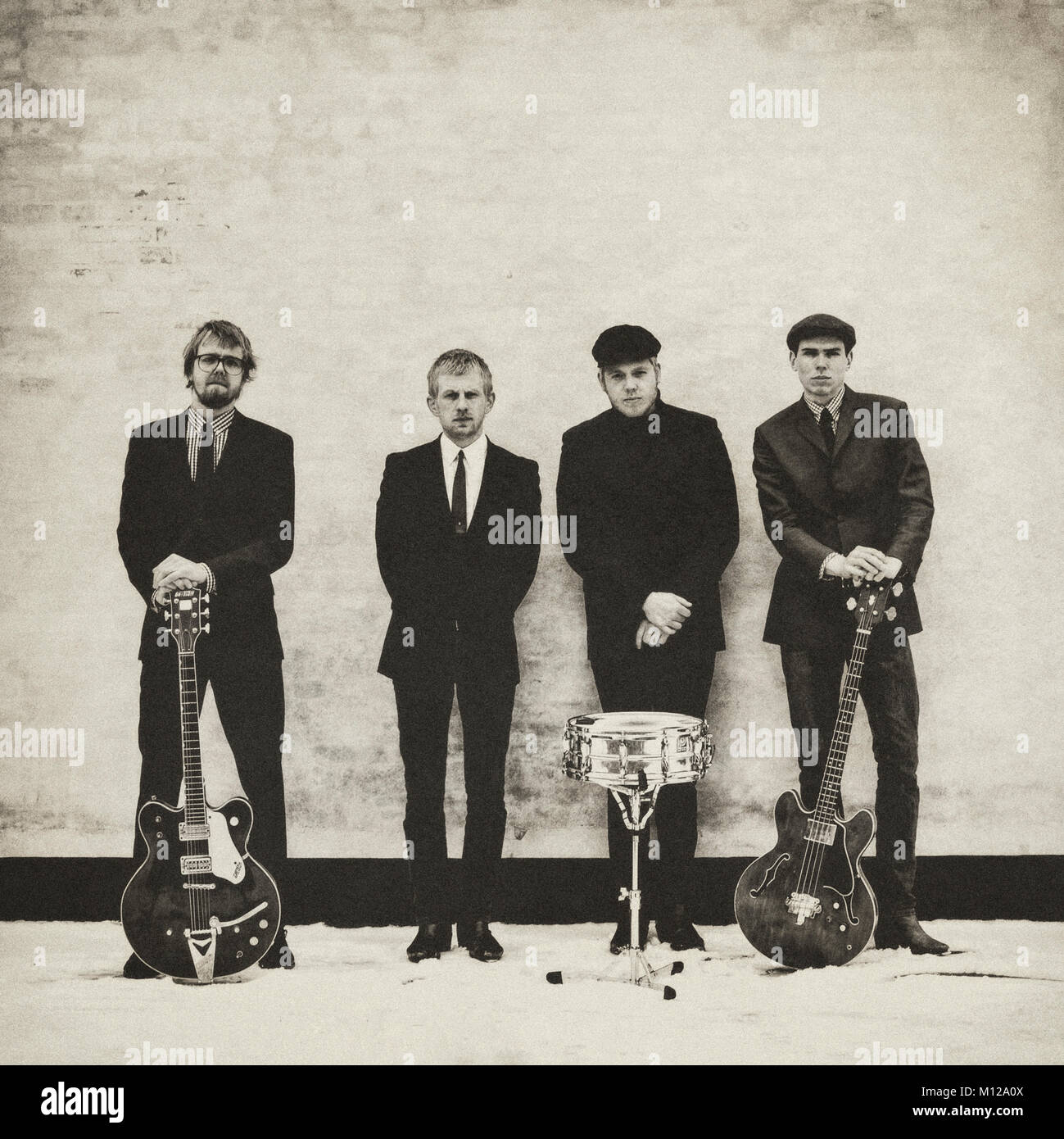 Le groupe de rock garage danois Le Jeune effectue la musique rock des années 60 et de l'Amérique est ici représenté à la maison à Copenhague d'où le groupe est originaire. Danemark 16/03 2013. Banque D'Images