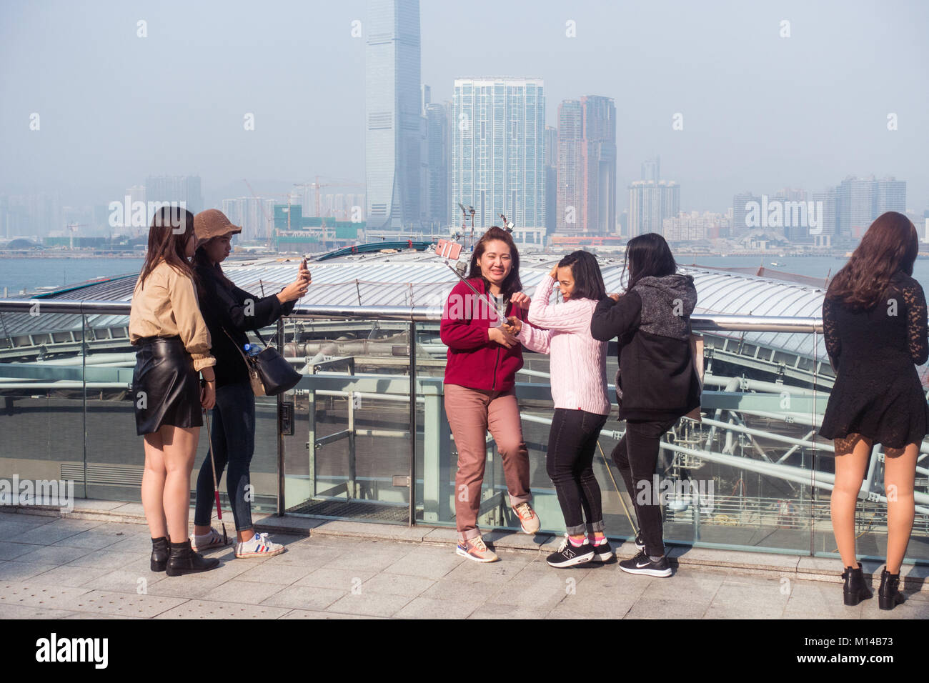 Les touristes de Hong Kong prennent des photos dans la SFI Banque D'Images Les touristes de Hong Kong prennent des photos dans la SFI Banque D'Images