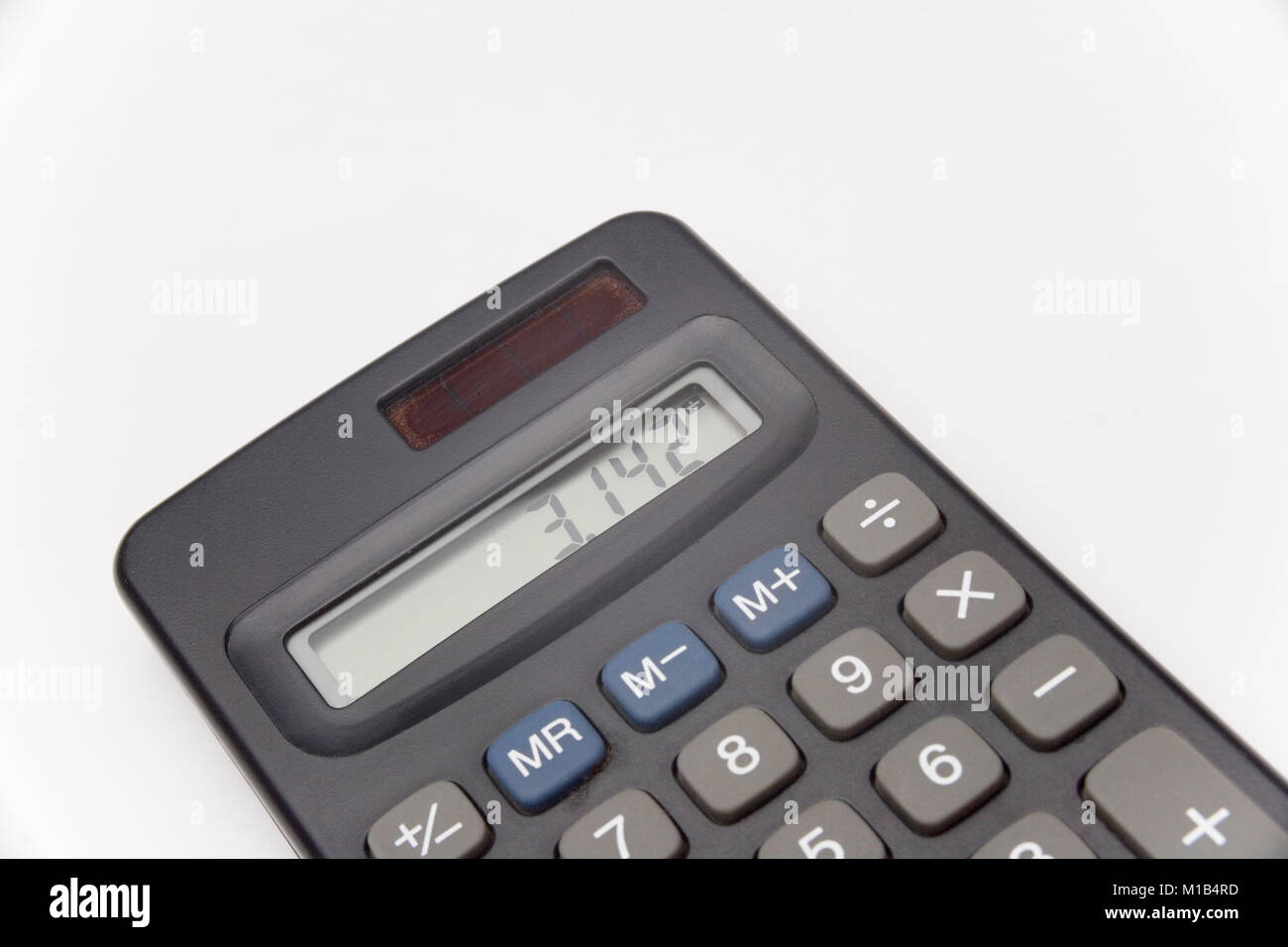 Calculatrice sur fond blanc montrant valeur de pi Banque D'Images