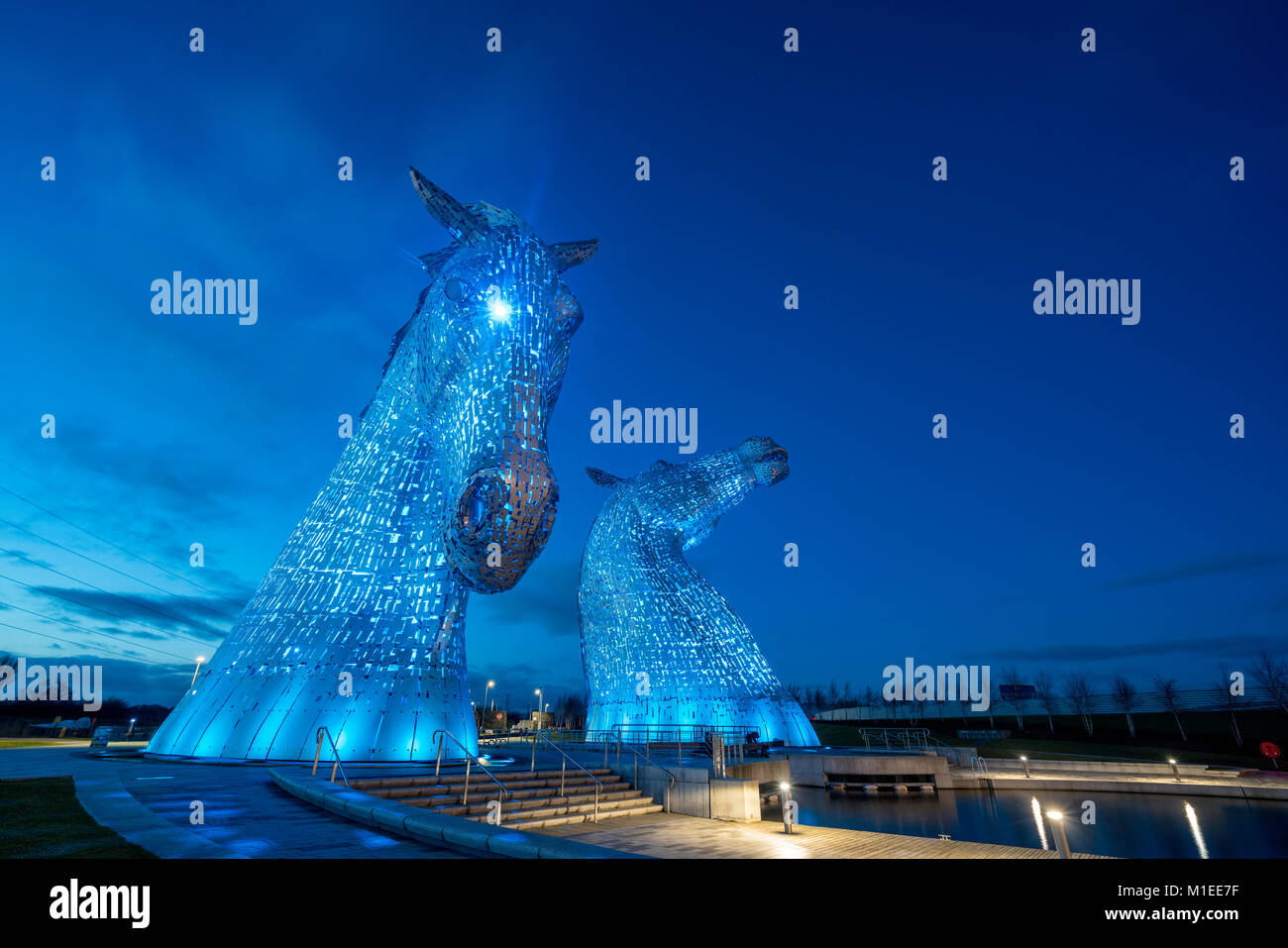 Vue de la nuit , Kelpies grandes sculptures de chevaux, à l'Hélix Park à Falkirk, Ecosse, Royaume-Uni Banque D'Images