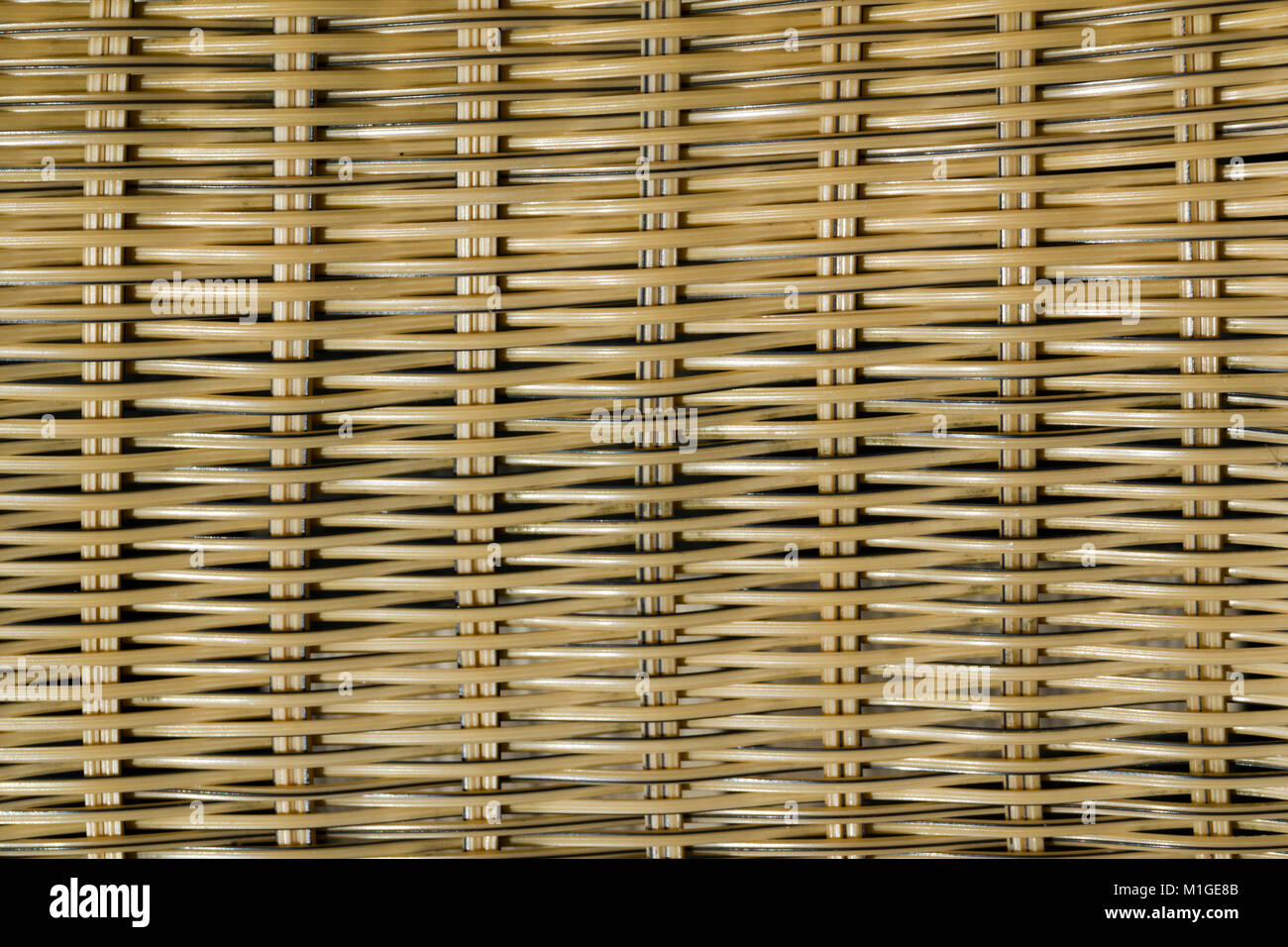 Chaise de jardin en plastique effet osier plein cadre détail close up Banque D'Images