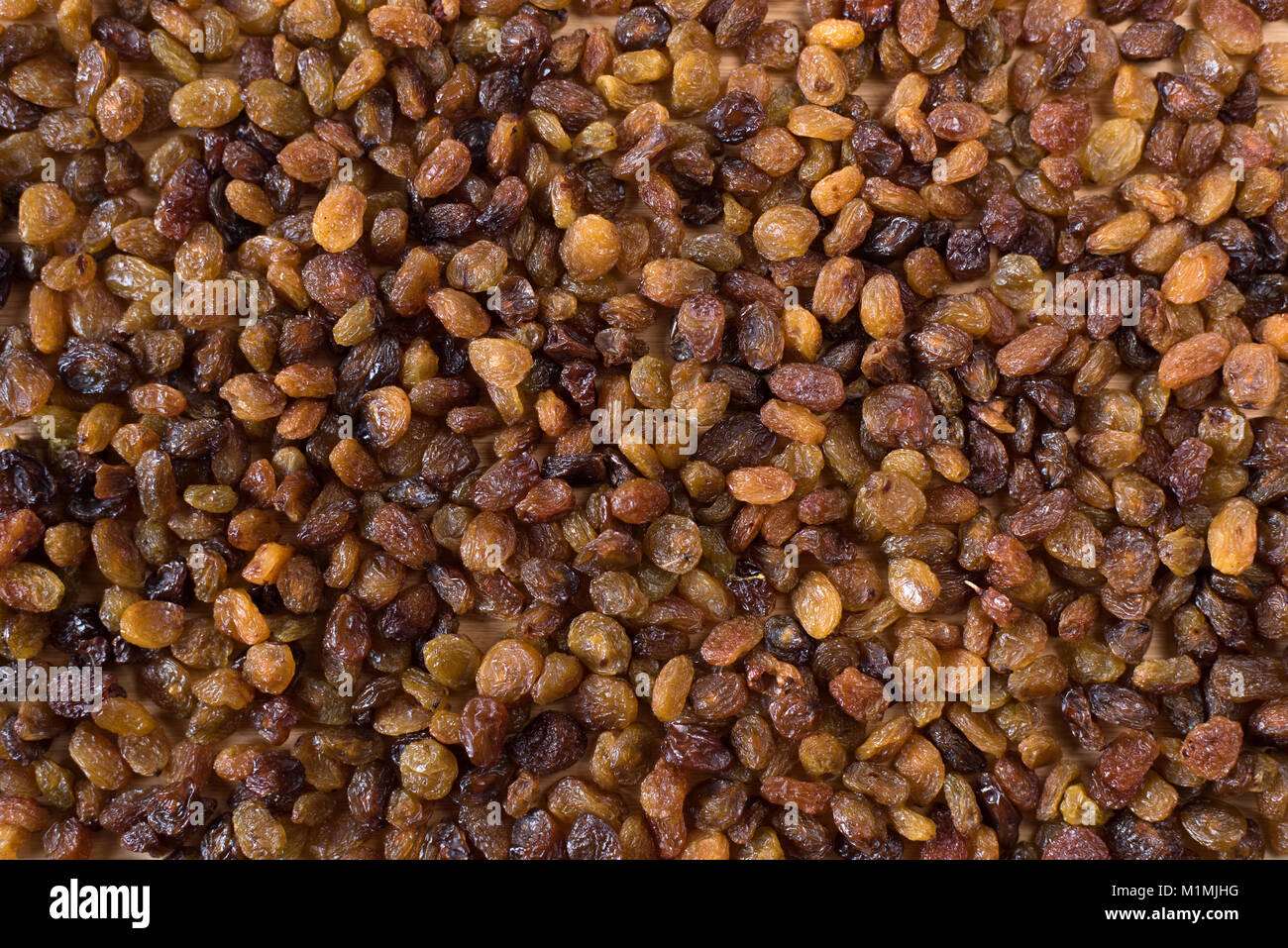 Tas de raisins secs comme un arrière-plan. concept de publicité d'une saine alimentation Banque D'Images