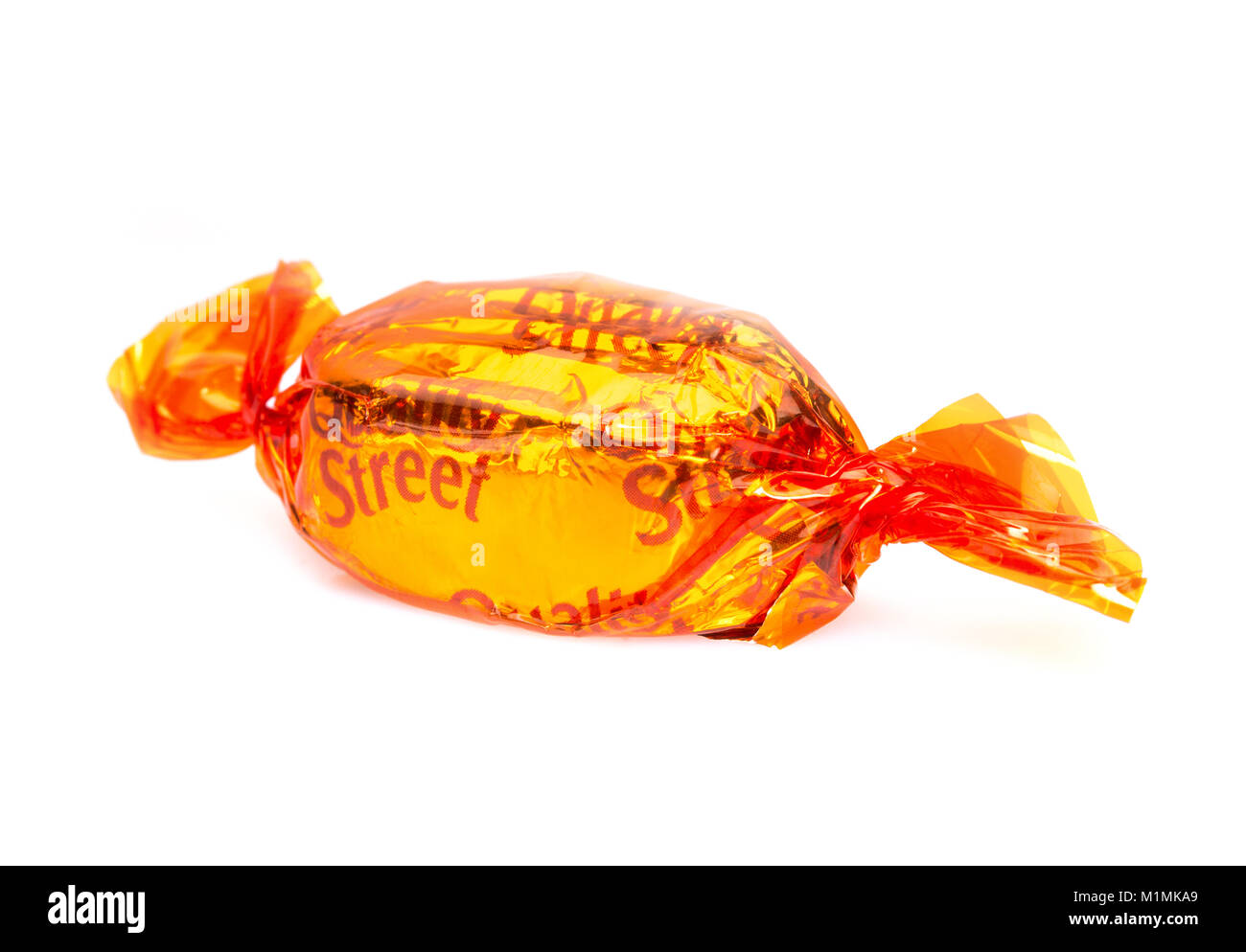 Crème chocolat Orange Quality Street sur fond blanc Banque D'Images