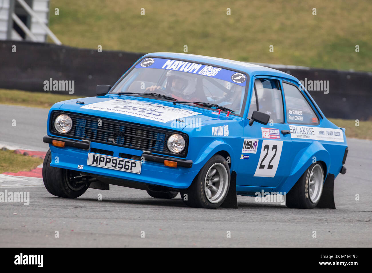 Ford Escort avec chauffeur Stuart Cogger et co-pilote Ade étés au Motorsport News Rally Championship, Circuit de Snetterton, Norfolk, Royaume-Uni. Banque D'Images