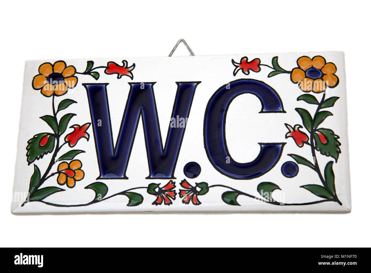 Wc en porcelaine florale (eau penderie Plaque) Banque D'Images
