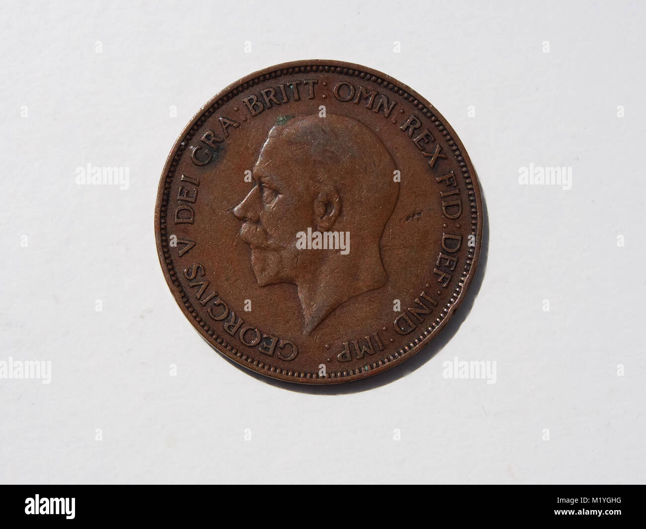 Une pièce de un penny britannique de 1936 montrant la tête du roi George V Banque D'Images