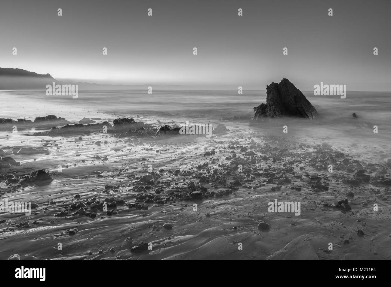 La beauté des plages d'Asturies, envisagé au lever et au coucher du soleil, de mettre en évidence ses caractéristiques uniques, sont à visiter, où vous pouvez Banque D'Images