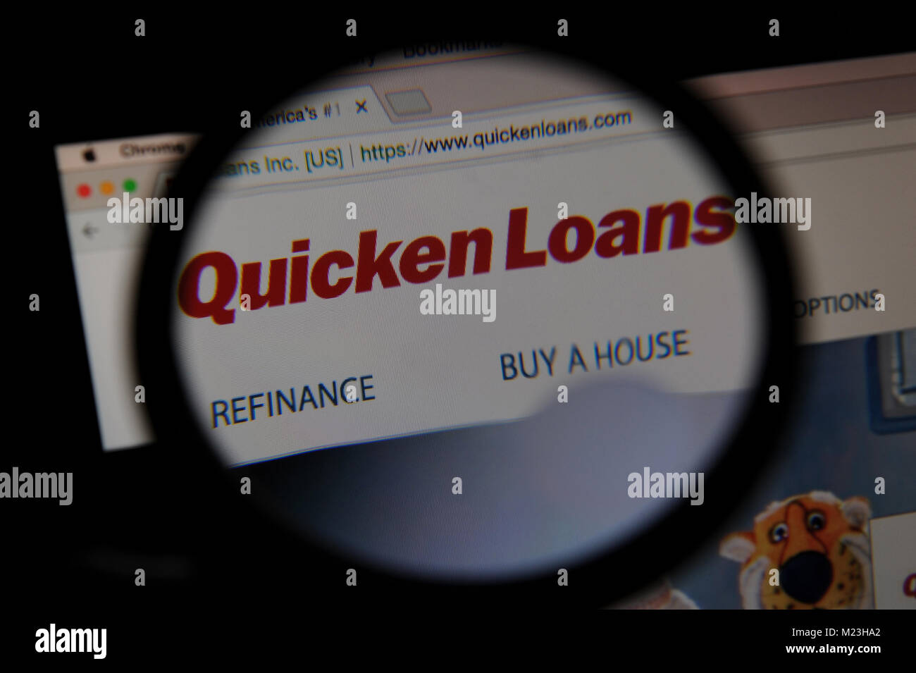 Quicken Loans website vu à travers un verre Miroir grossissant Banque D'Images
