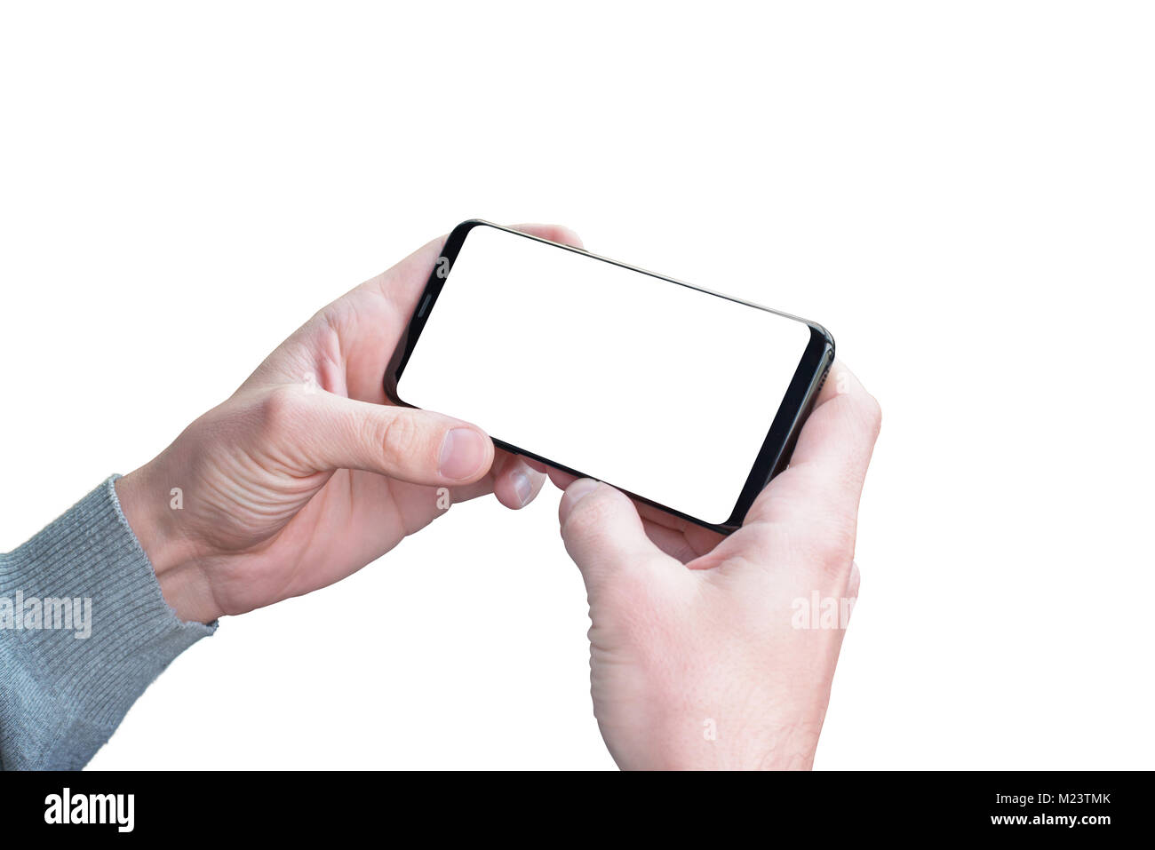 Mains isolées et le téléphone mobile en position horizontale pour l'app, maquette, vidéo, conception de jeux présentation. Banque D'Images