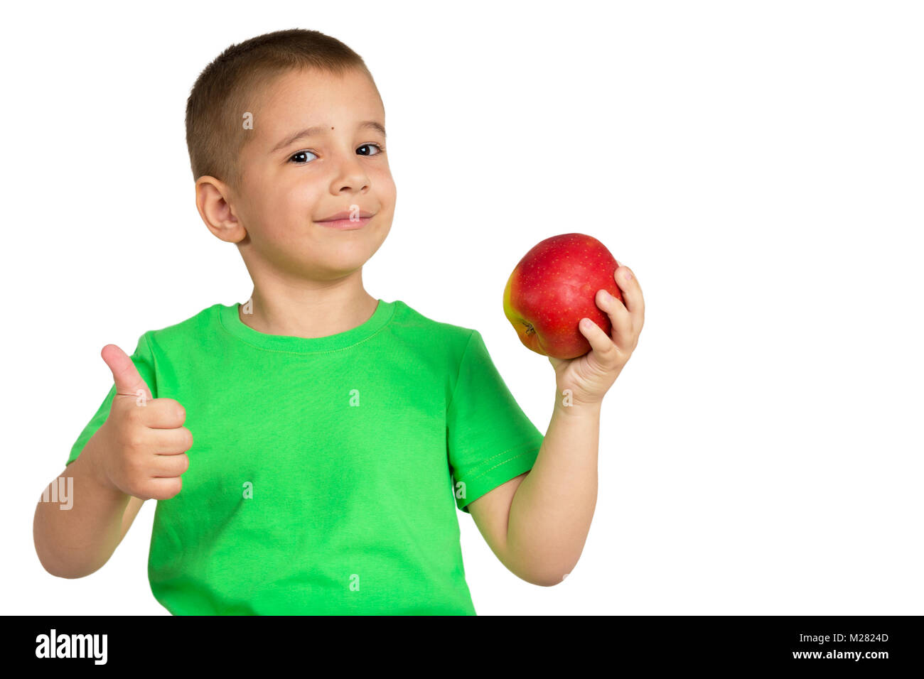 Portrait d'un enfant heureux avec des pommes dans les mains sur un fond blanc Banque D'Images