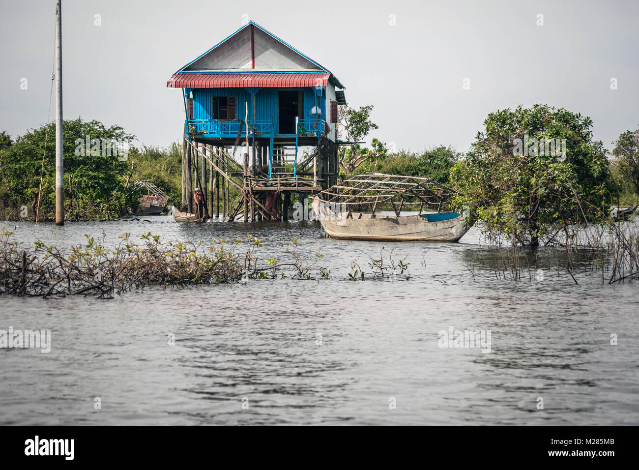 Maisons sur pilotis, Kampong Phluk village flottant, la Province de Siem Reap, au Cambodge. Banque D'Images