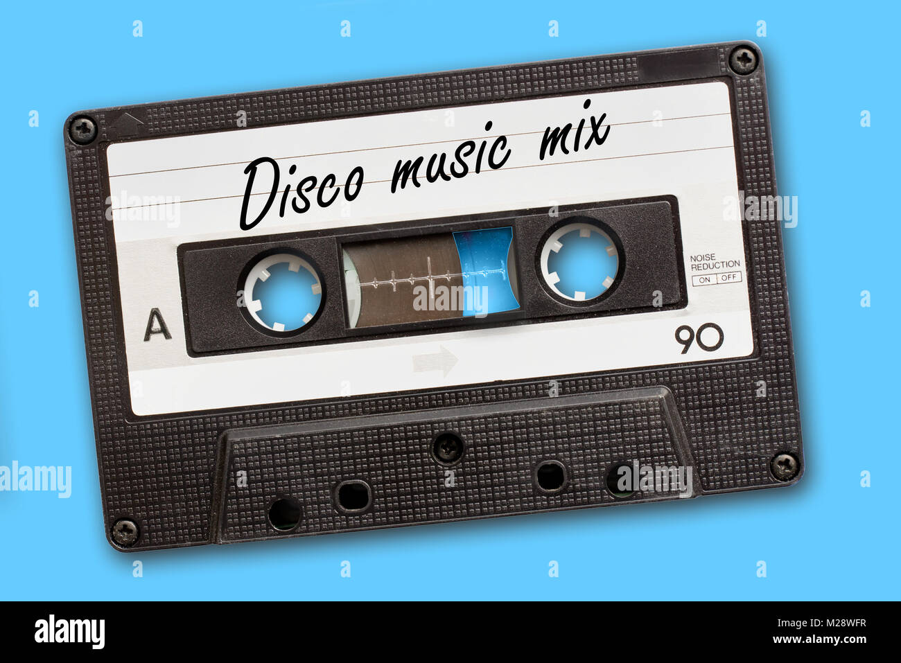 La musique Disco Mix écrit sur vintage cassette audio, sur fond bleu Banque D'Images