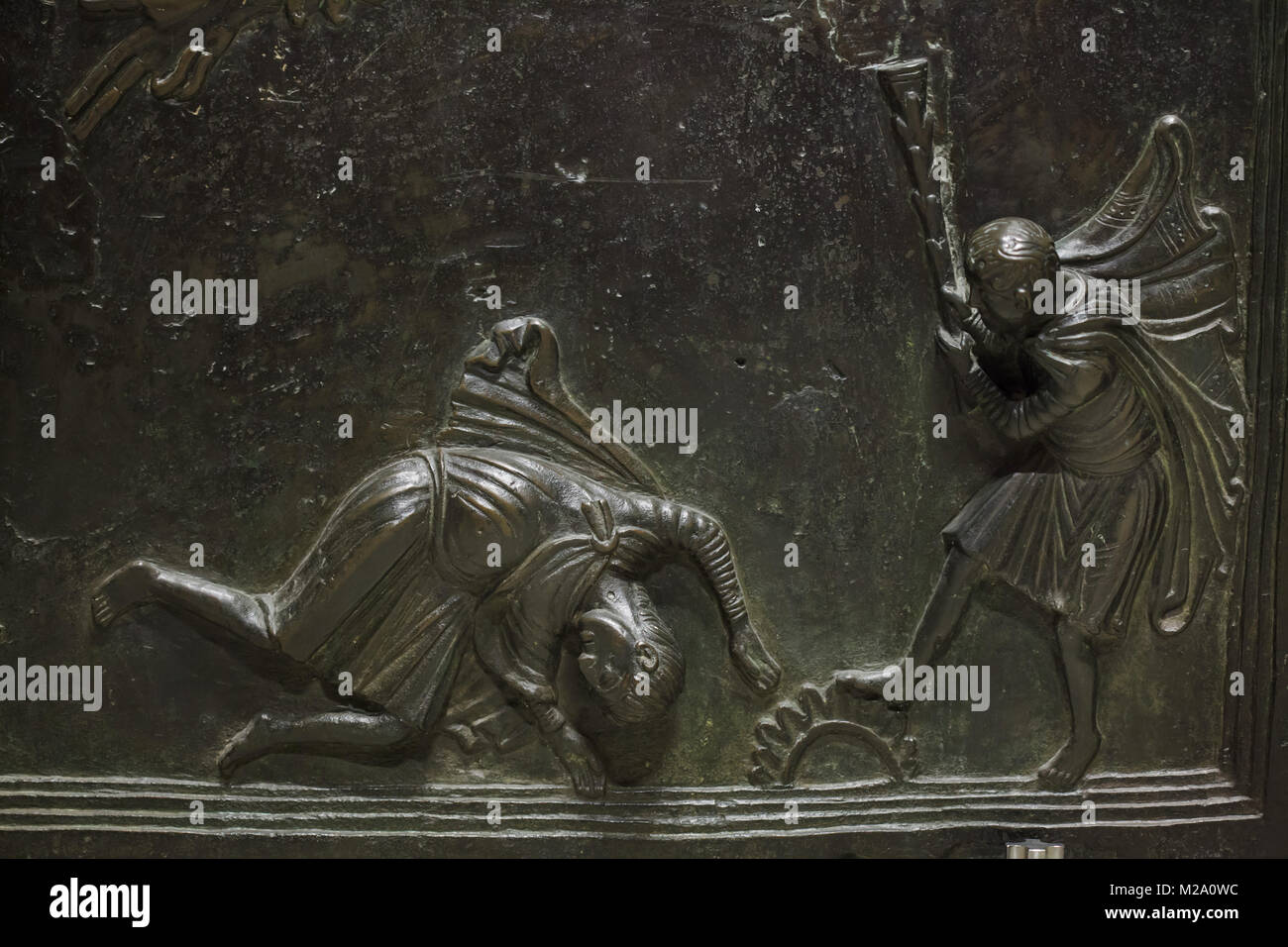 Caïn tuant Abel. Dans la décharge de bronze roman Bernward Portes (Bernwardstür) à partir de la 11e siècle dans la cathédrale de Hildesheim (Hildesheimer Dom) dans la région de Hildesheim, en Basse-Saxe, Allemagne. Banque D'Images