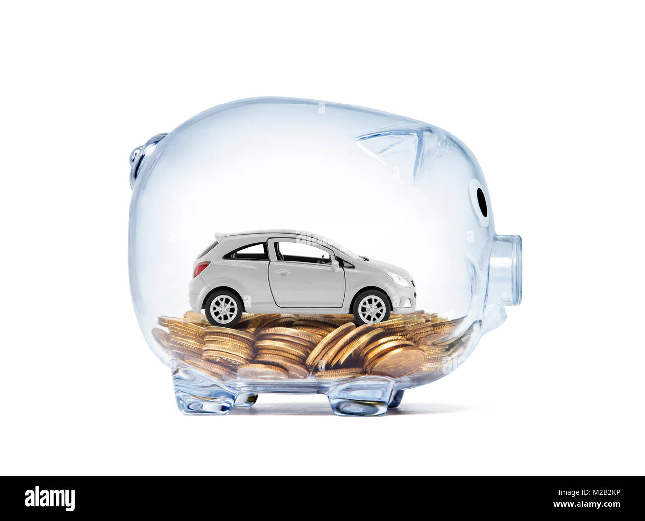 Miniature de voiture sur l'argent à l'intérieur transparent piggy bank with clipping path Banque D'Images