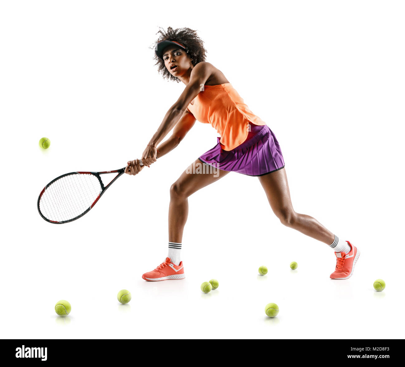 Jeune fille tennis en silhouette isolé sur fond blanc. Force et motivation Banque D'Images