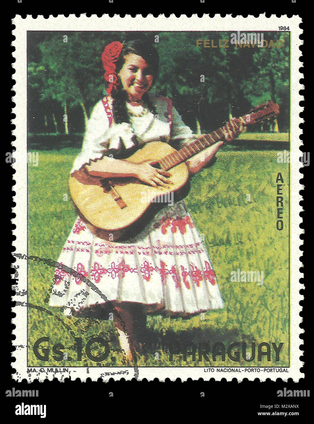 Paraguay - timbres en 1984 : Couleur edition sur Noël, montre femme paraguayenne en costume Banque D'Images