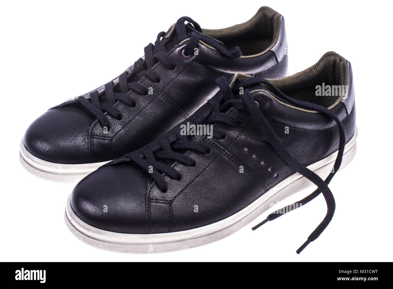 Hommes noir chaussures à semelles blanches Banque D'Images Hommes noir chaussures à semelles blanches Banque D'Images