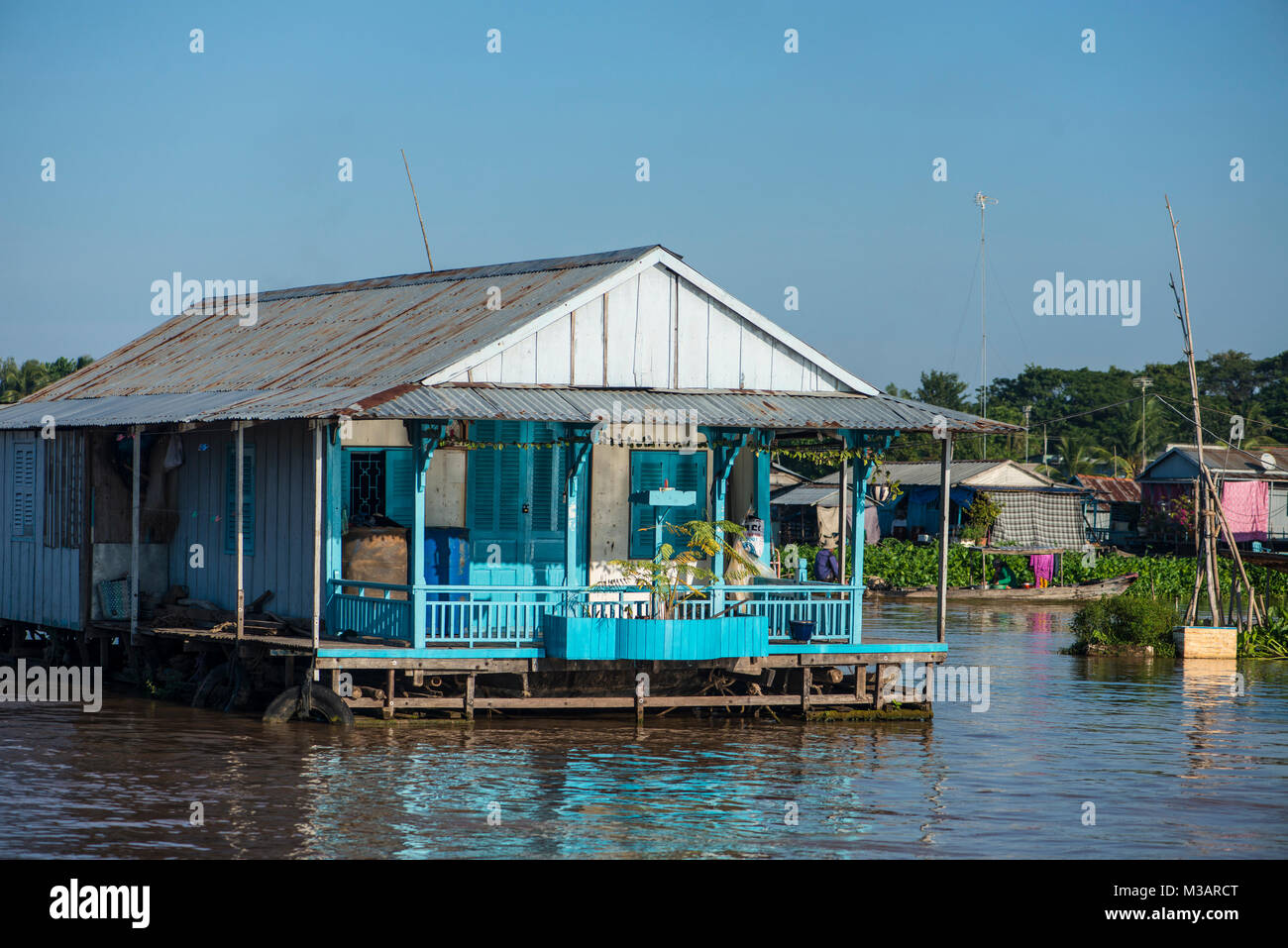 Maison sur la rivière, delta du Mékong, Vietnam Banque D'Images
