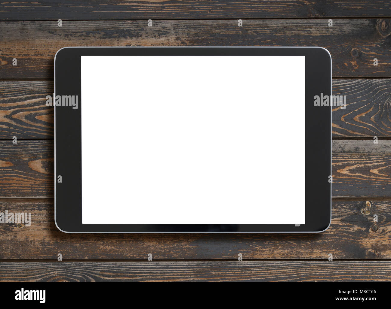 Tablet PC avec écran vide haut Vue sur la vieille table en bois Banque D'Images