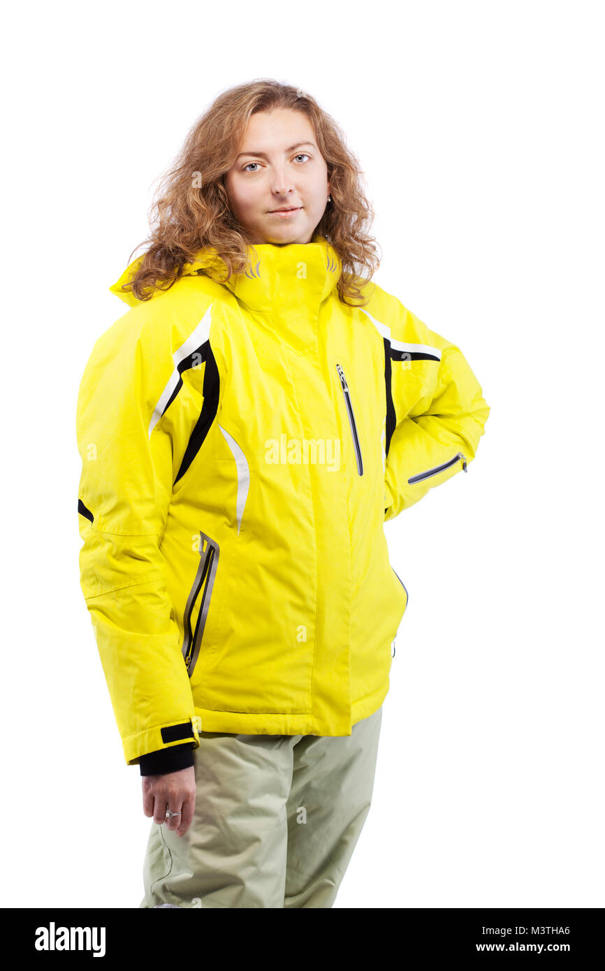 Skieur dans portrait femme veste jaune isolé sur fond blanc Banque D'Images