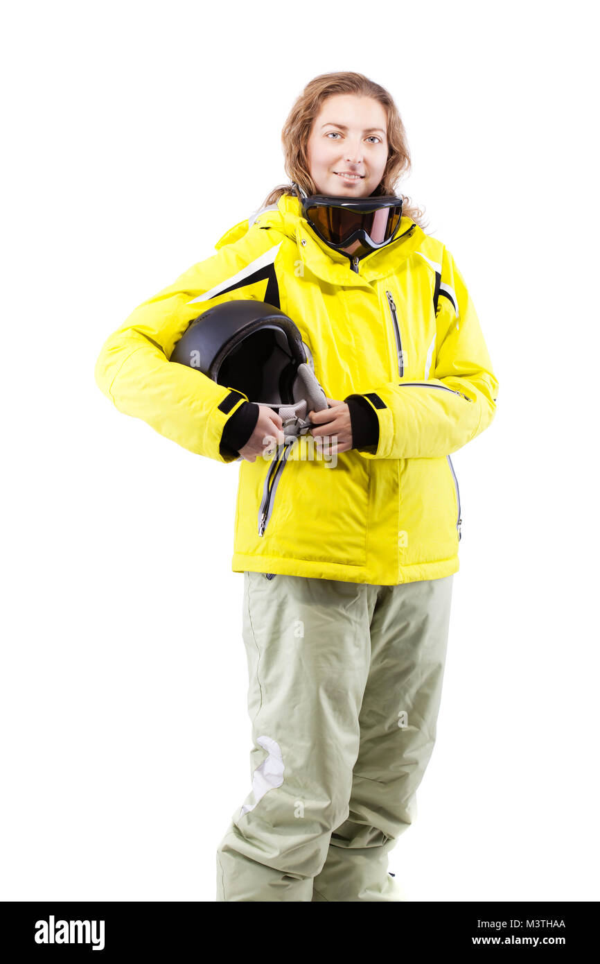 Skieur dans femme veste jaune avec casque isolé sur fond blanc Banque D'Images