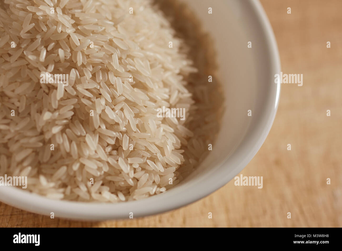 Blanc non cuit du riz Jasmin de Thaïlande Banque D'Images