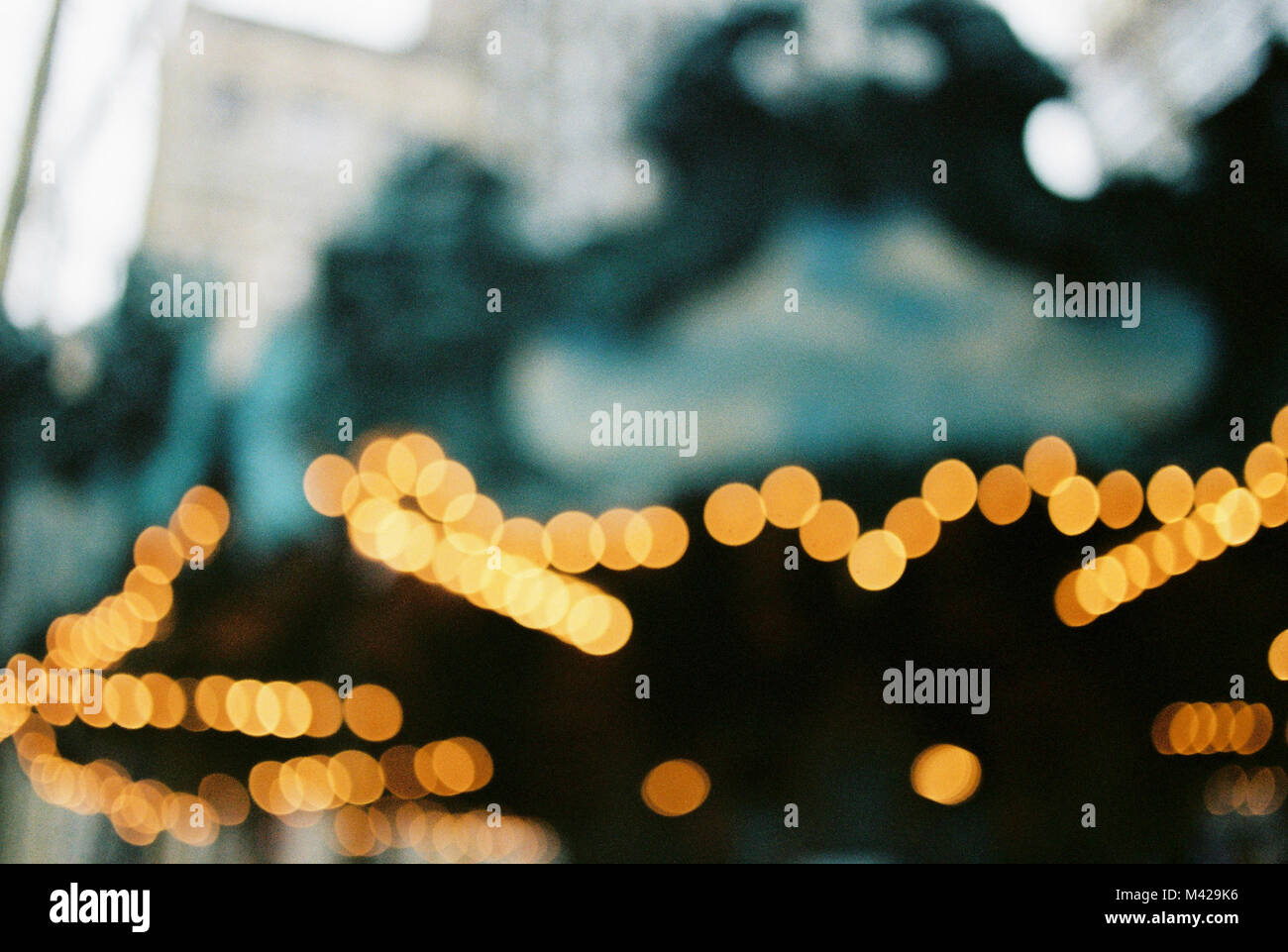 Image abstraite, floue lumières bokeh à partir d'un carrousel dans Central Park à New York Banque D'Images