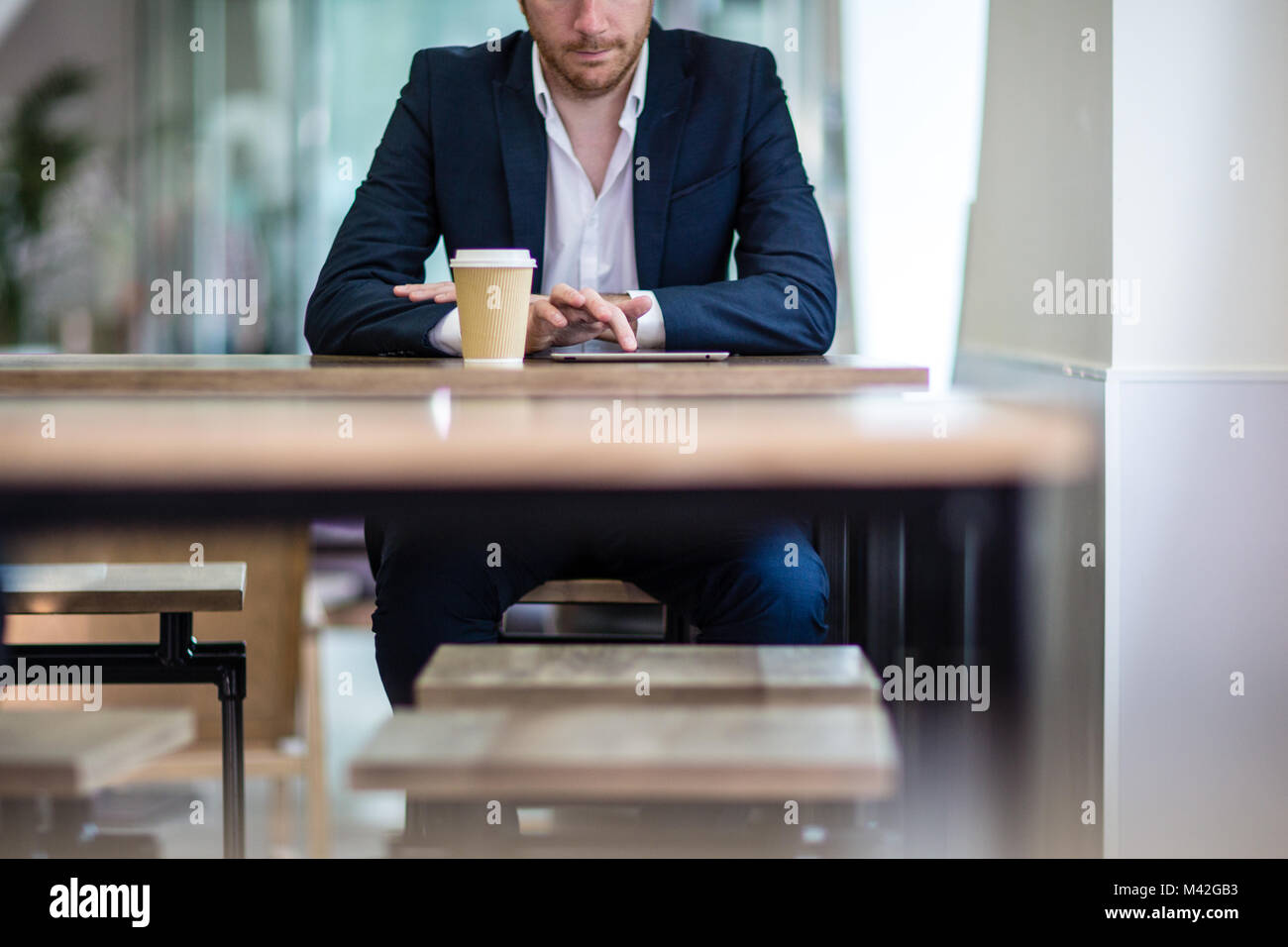 Close-up of businessman using a digital tablet Banque D'Images