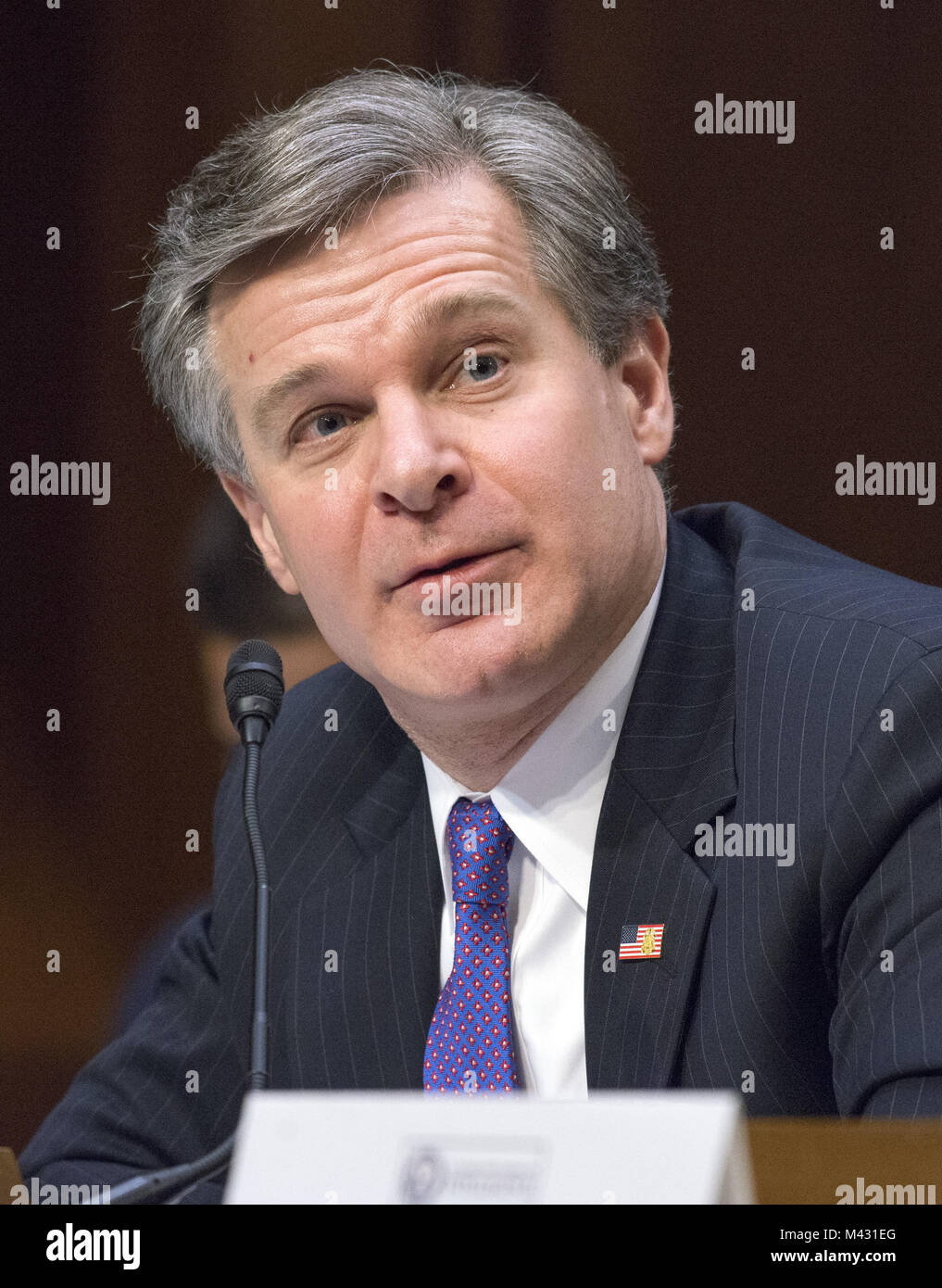 Washington, District de Columbia, Etats-Unis. Feb 13, 2018. Federal Bureau of Investigation (FBI) réalisateur Christopher Wray témoigne devant le comité du Sénat des États-Unis sur l'intelligence au cours d'une audience pour examiner les menaces à l'échelle mondiale sur la colline du Capitole à Washington, DC le Mardi, Février 13, 2018.Credit : Ron Sachs/CNP Crédit : Ron Sachs/CNP/ZUMA/Alamy Fil Live News Banque D'Images