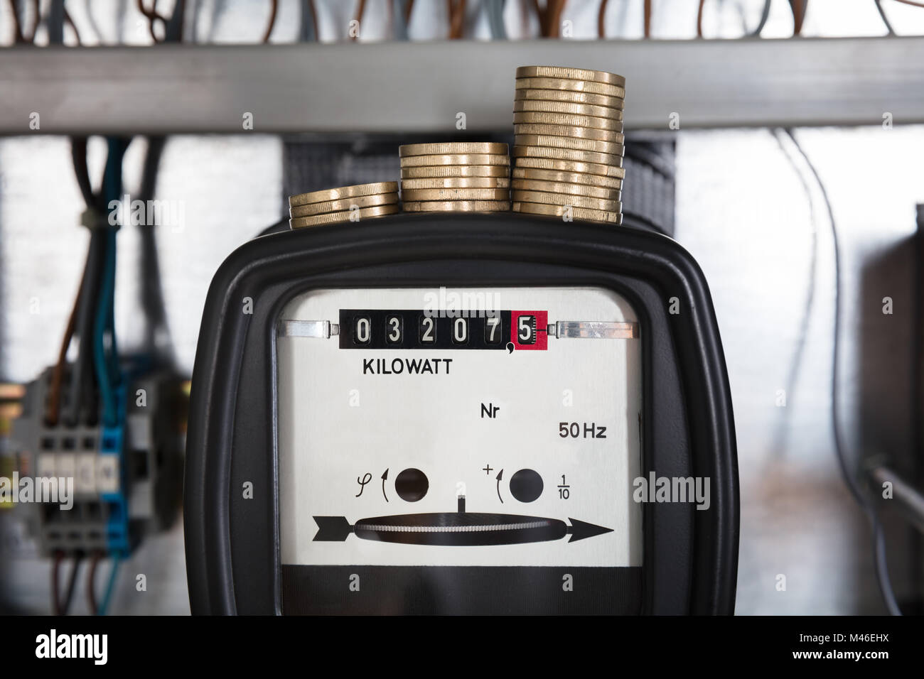 Close-up of a coin empilés sur mesure des compteurs d'électricité Kilowatt Banque D'Images