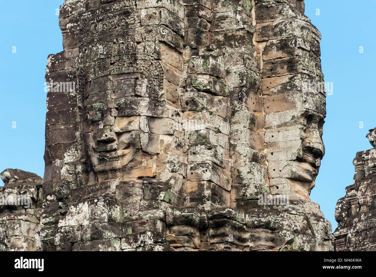 Visages de pierre à Lokesvara temple Bayon, Angkor Thom, au Cambodge Banque D'Images