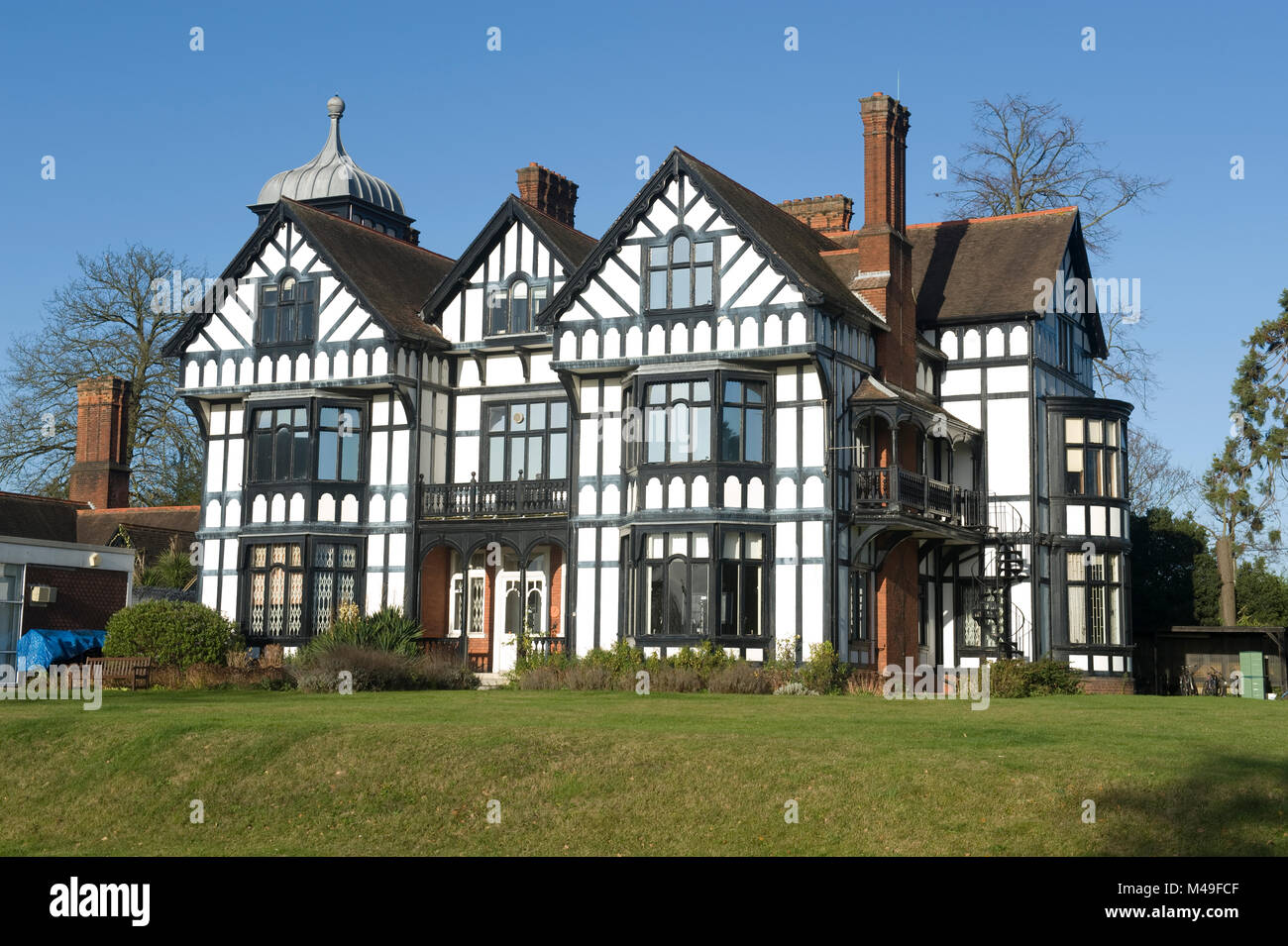 Le simple, néo-Tudor House, construite en 1887 par George Devey dans Parc Herschel, Upton, Slough, Berkshire, Angleterre. Banque D'Images