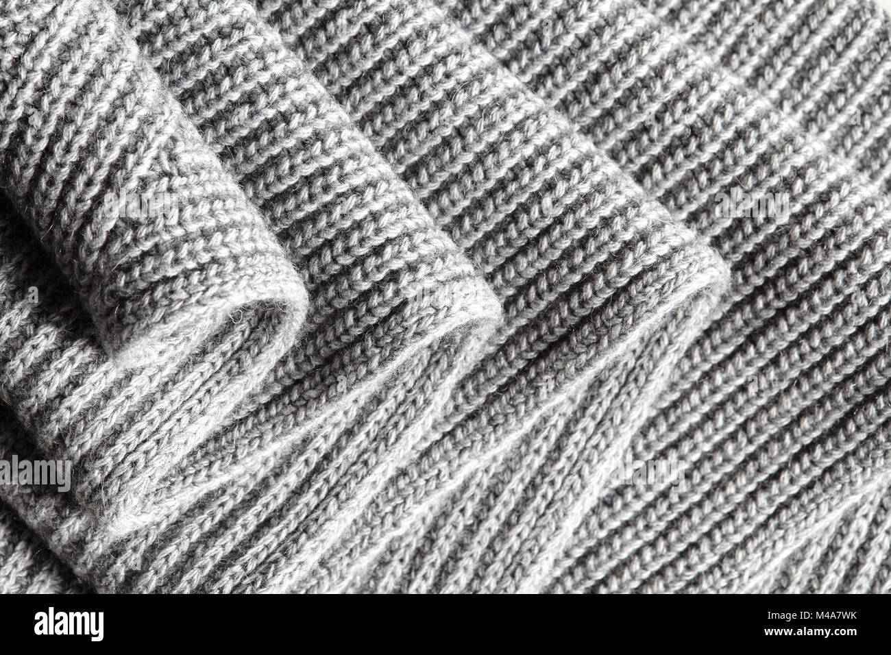 Ruched gris foncé tissu de laine tricoté fond temps frais Banque D'Images