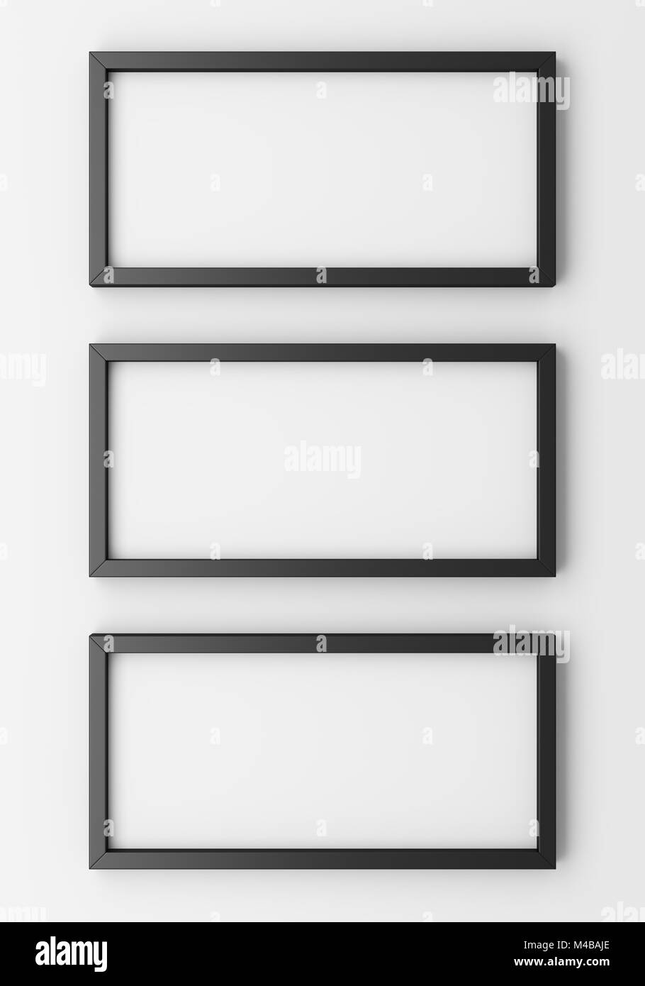 Trois cadres photo noir blanc sur mur blanc Banque D'Images