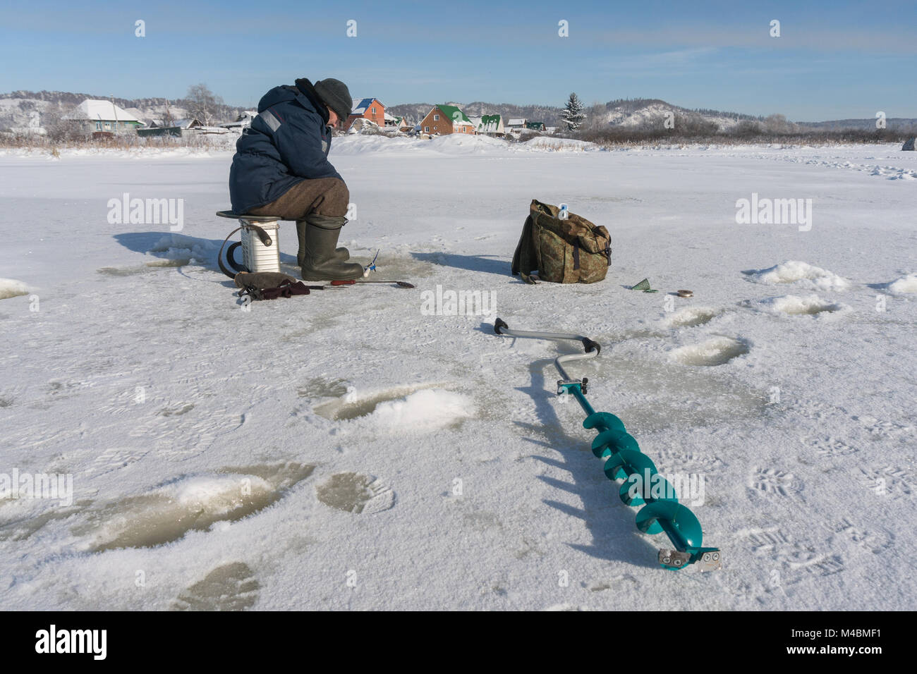 Pêcheur d'hiver Banque D'Images