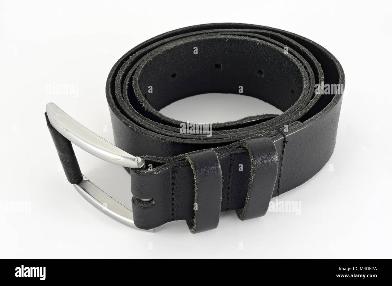 Roulé de ceinture en cuir noir Photo Stock - Alamy