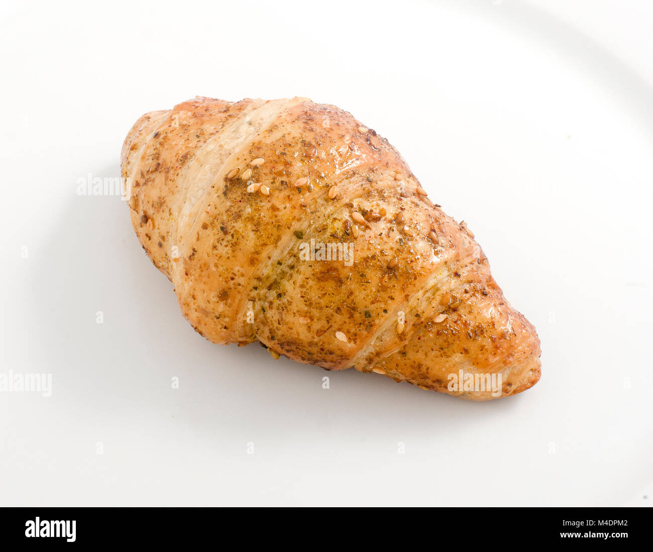 Zatar croissant isolated on white Banque D'Images