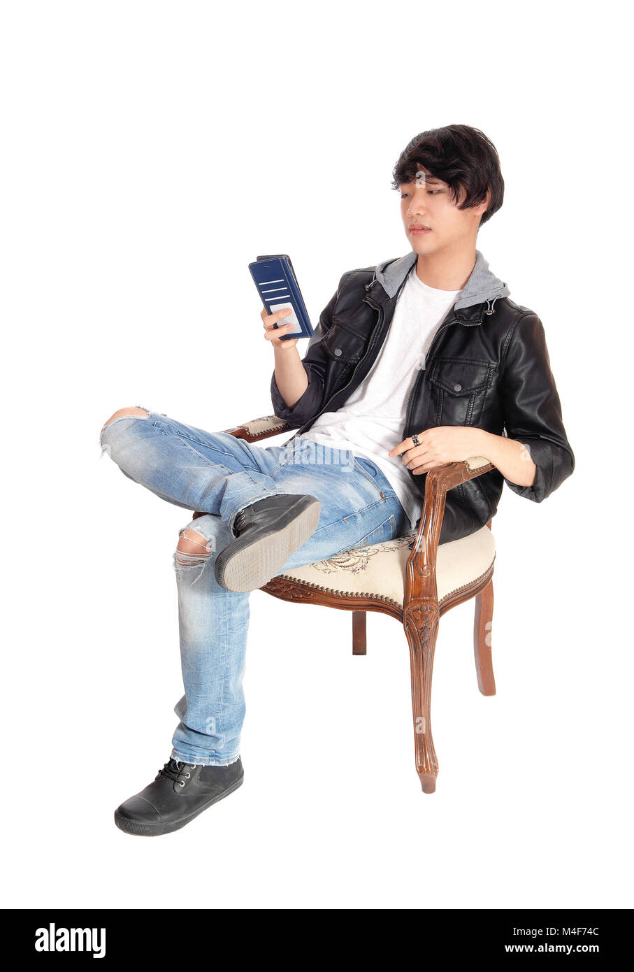 Asian man sur son téléphone cellulaire. Banque D'Images