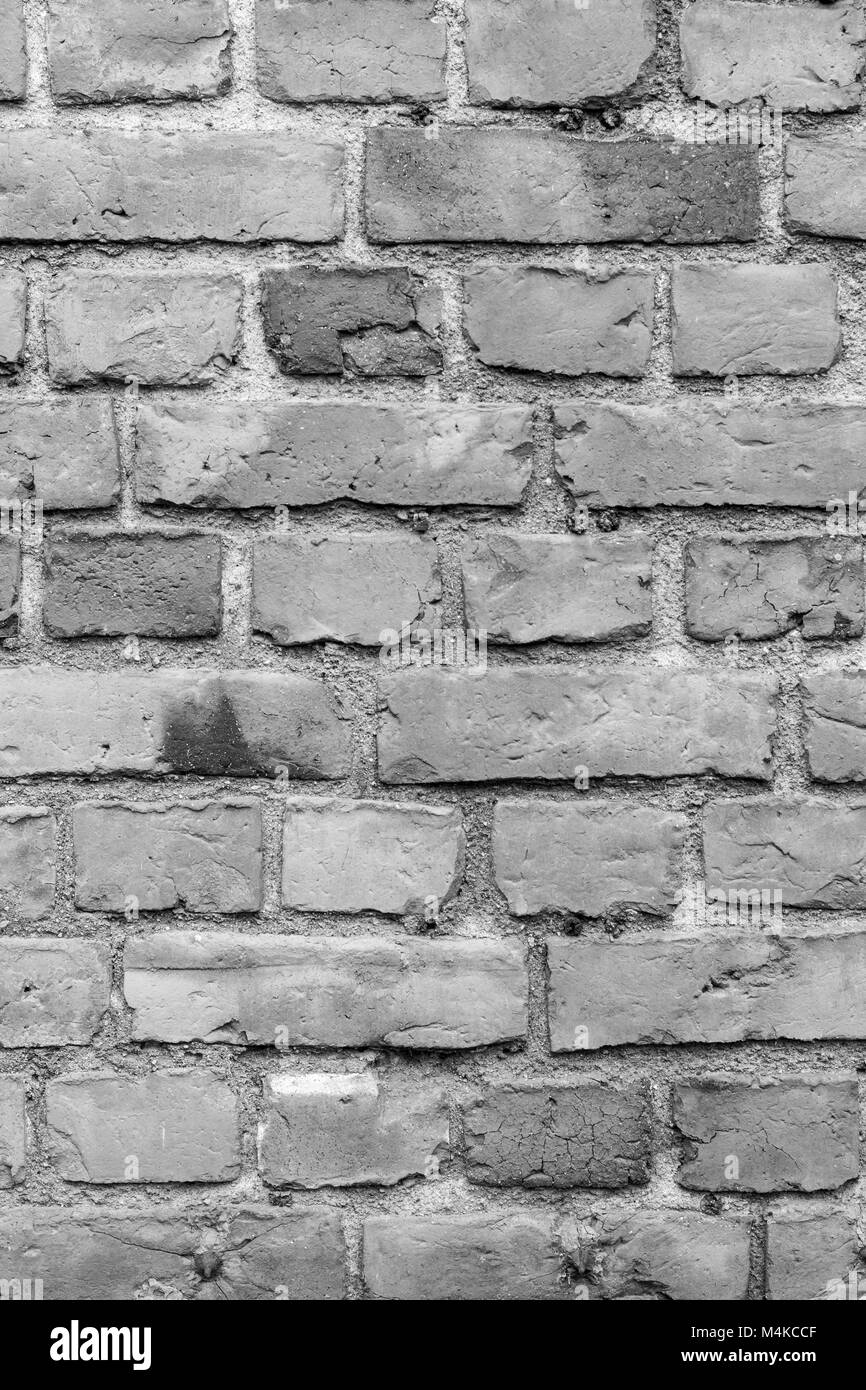 Vieux mur de briques détériorées texture background en noir et blanc. Banque D'Images