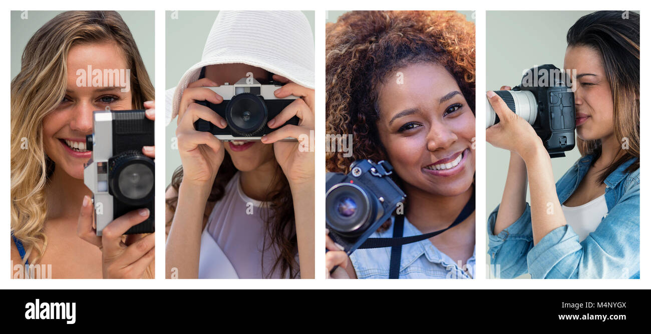 Smiling woman taking picture Banque D'Images