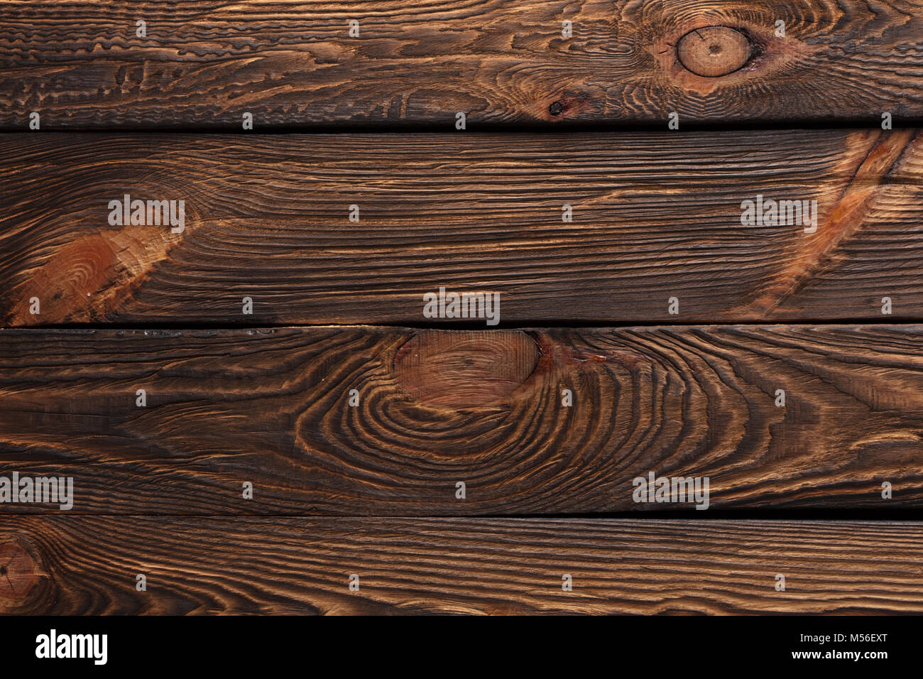 La texture des conseils d'anciens bois marron foncé Photo ...