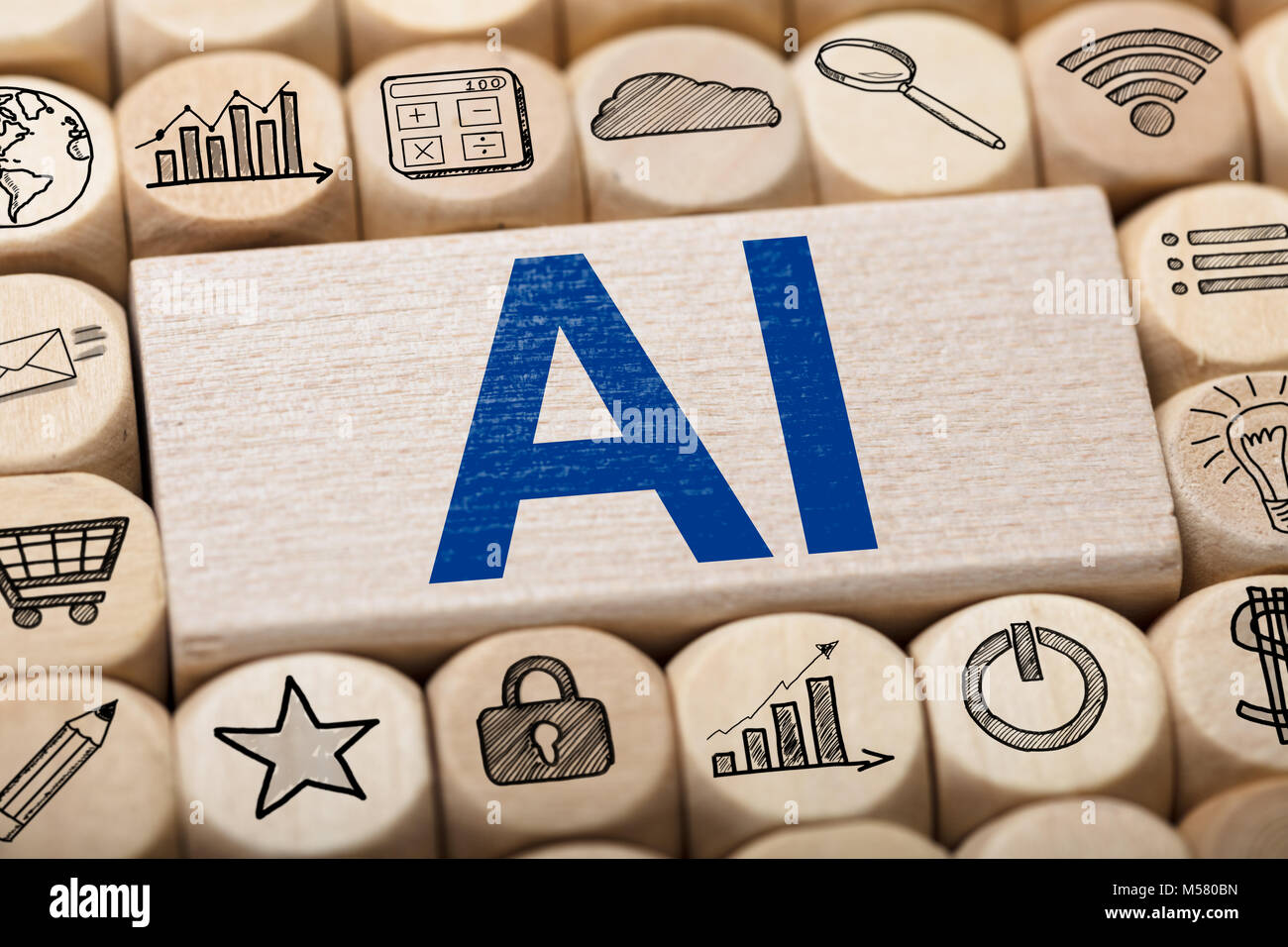 Full Frame shot d'AI le texte sur un bloc en bois entouré par diverses icônes de l'ordinateur Banque D'Images