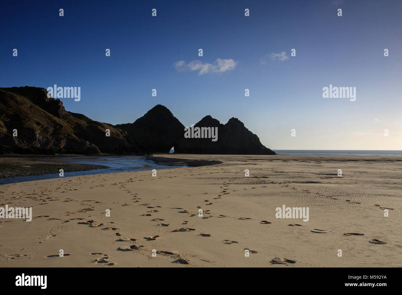 Traces sur le sable trois falaises Bay, la péninsule de Gower, Swansea Banque D'Images
