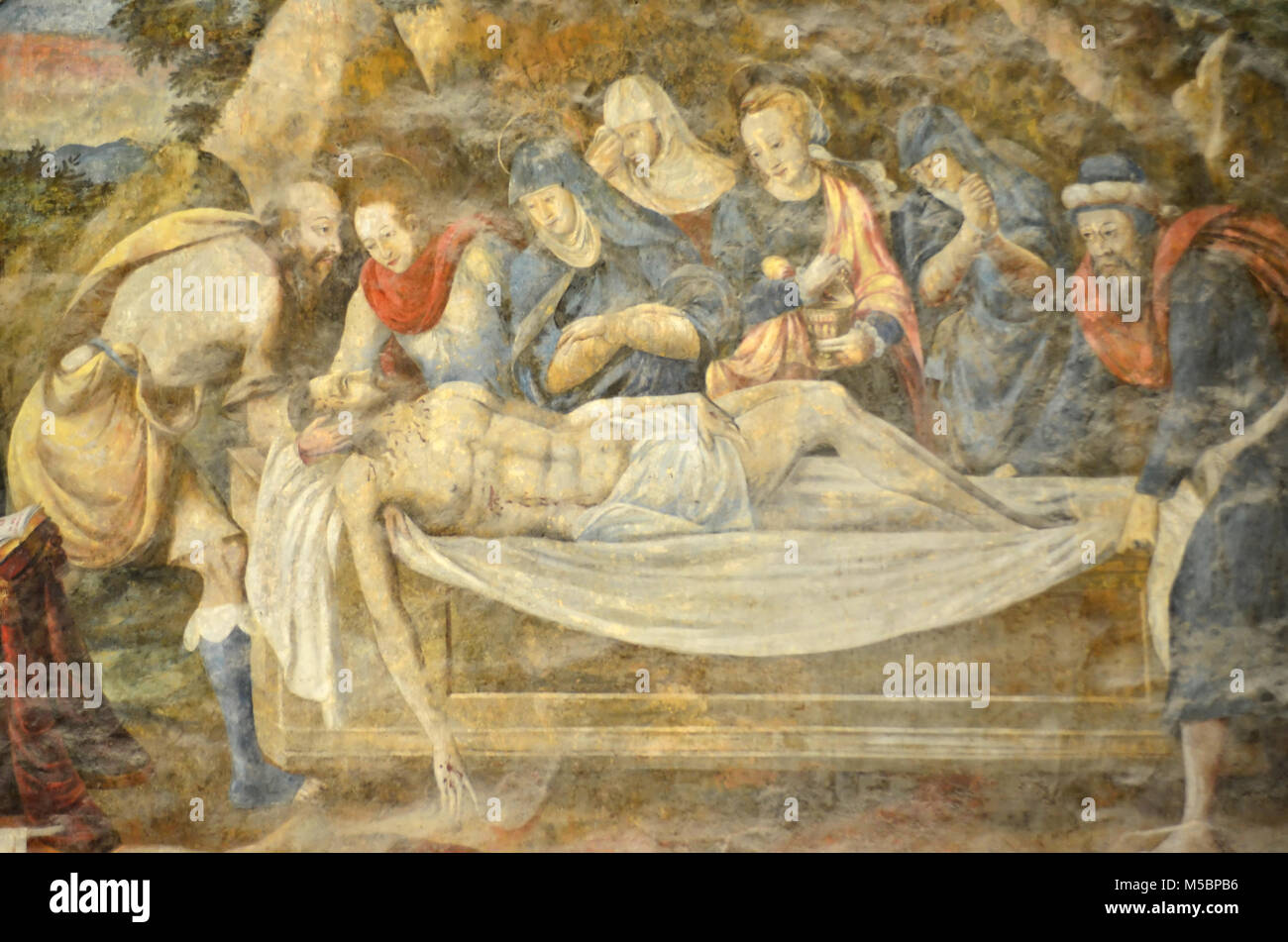 Fresque médiévale de Jésus étant mis sur un linceul après avoir été descendu de la croix Banque D'Images
