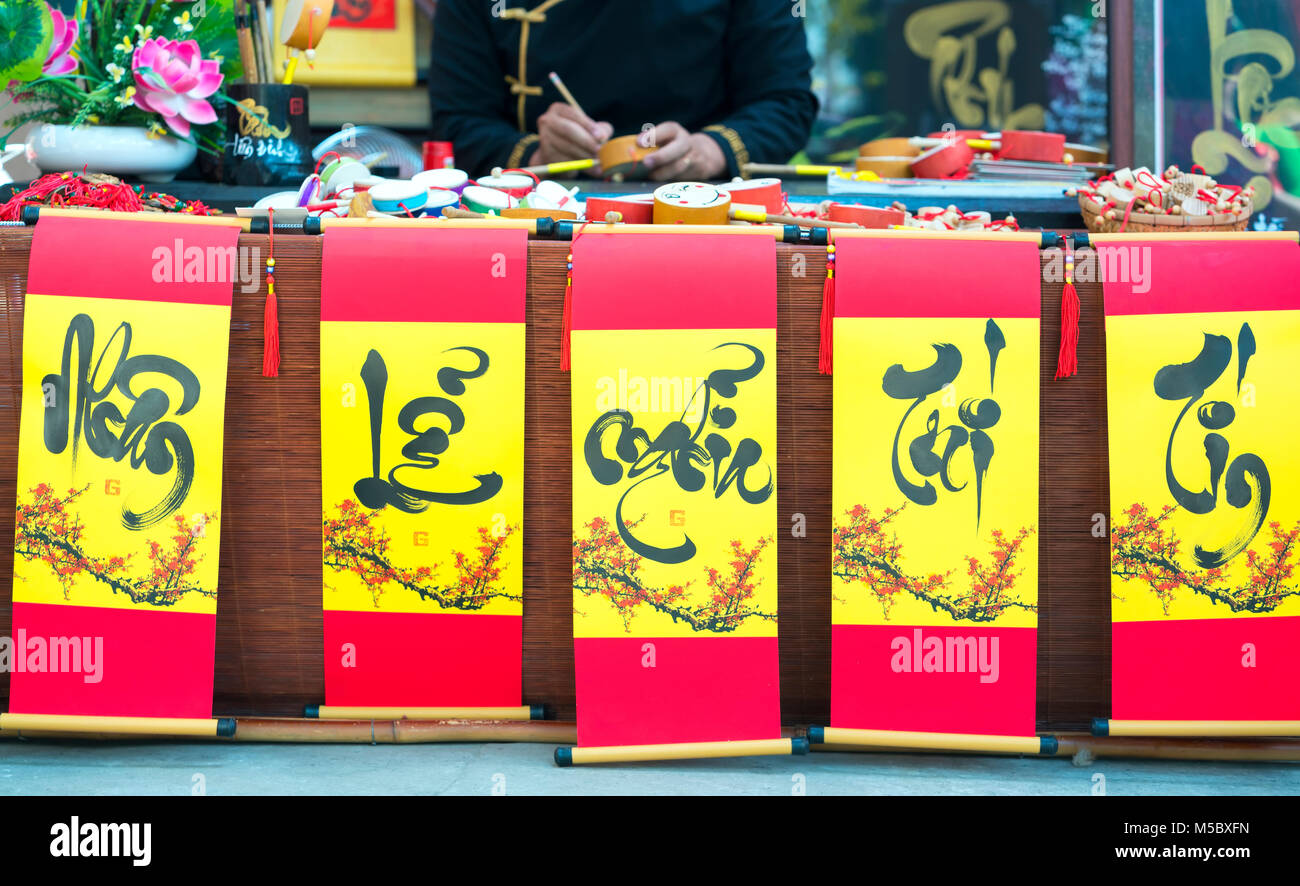 Nouvel An lunaire décoré de calligraphie avec texte 'Merit, fortune, la longévité en vietnamien des sens qui est propriétaire aura de la chance, la réussite et de vivre les pieds dans l'eau Banque D'Images
