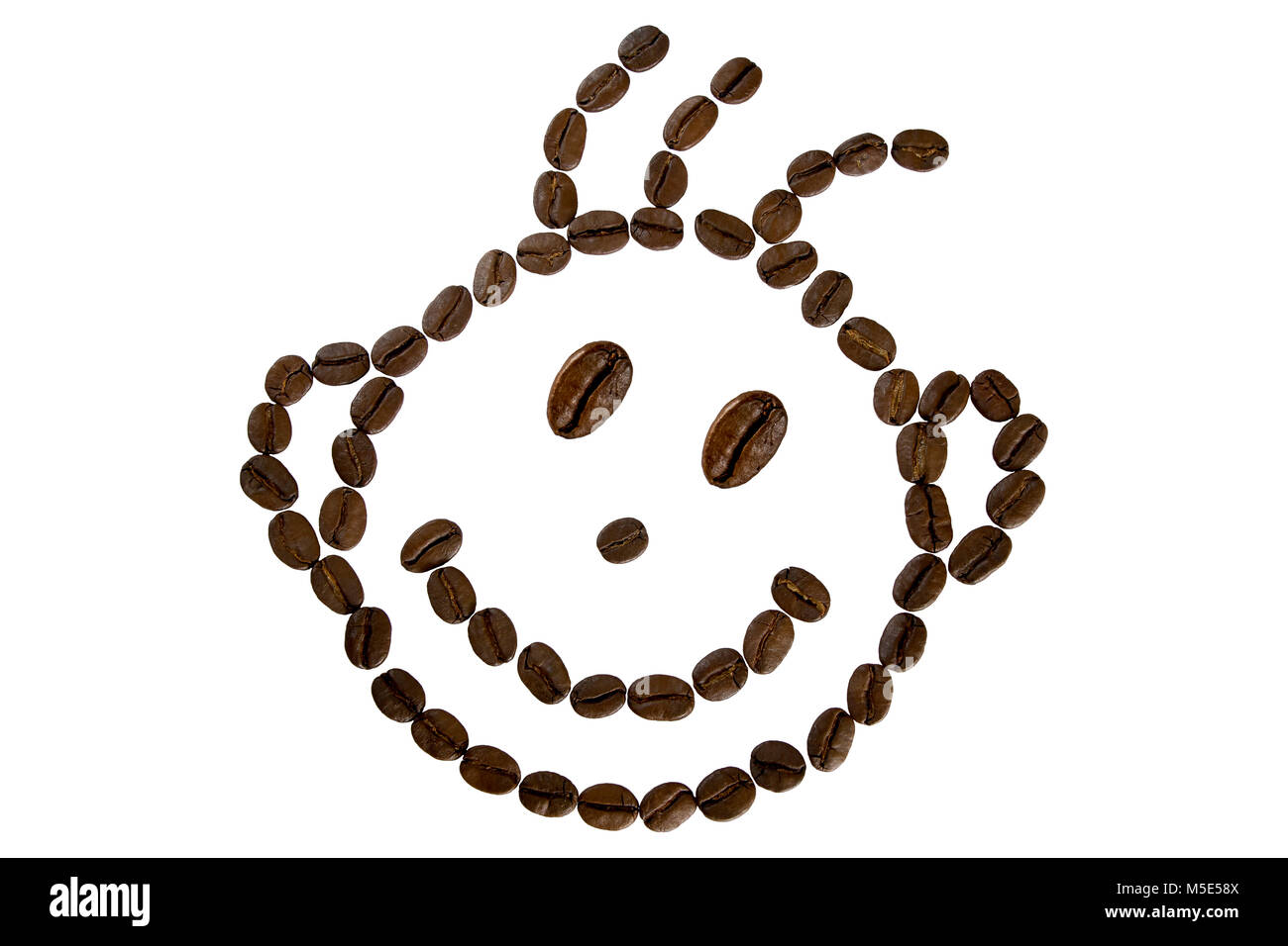 Drôle de visage avec des grains de café Banque D'Images