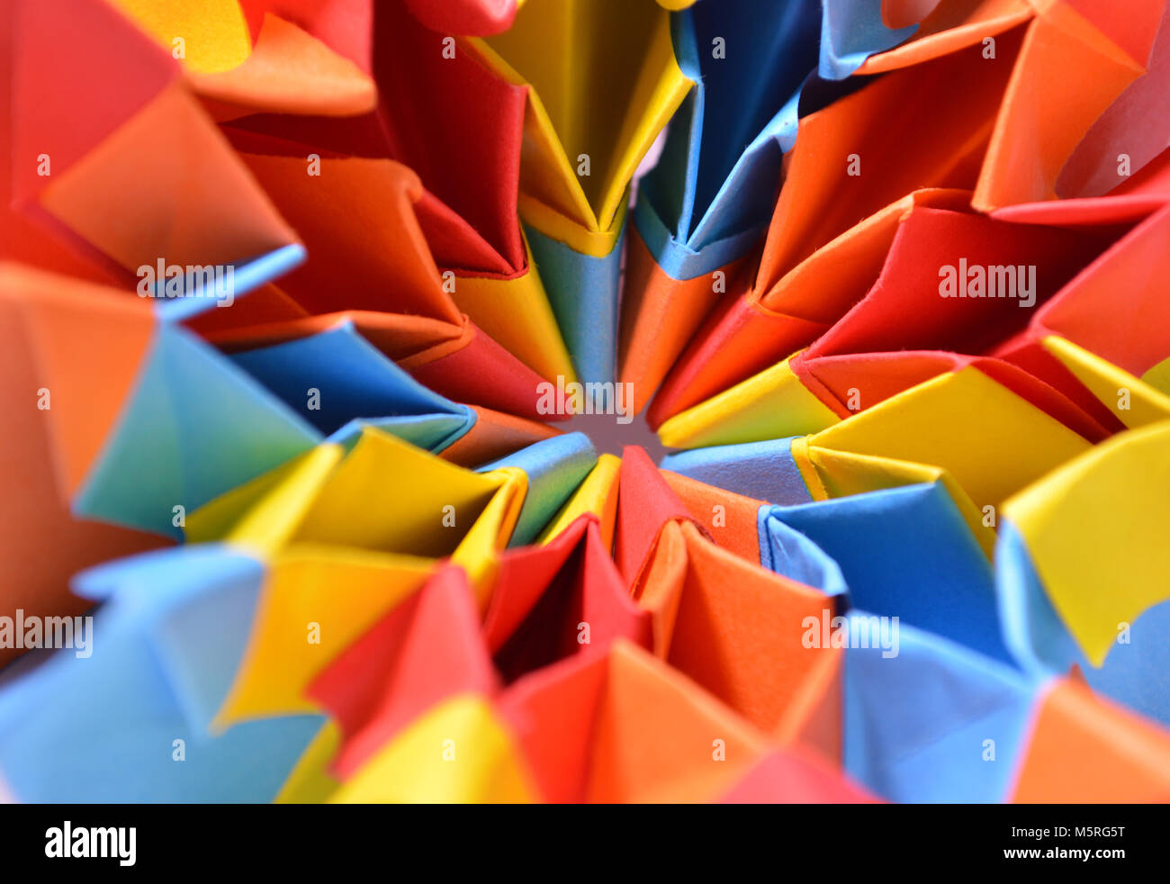 Papier plié origami star multicolore forme close up detail Banque D'Images