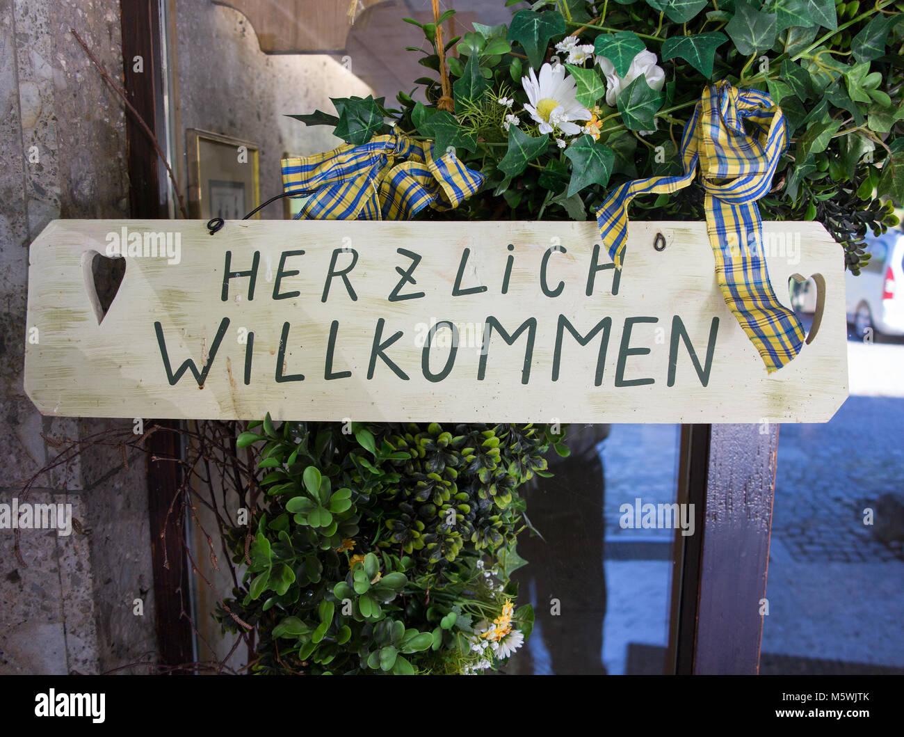 Herzlich willkommen Bienvenue se traduit en signe en anglais Banque D'Images