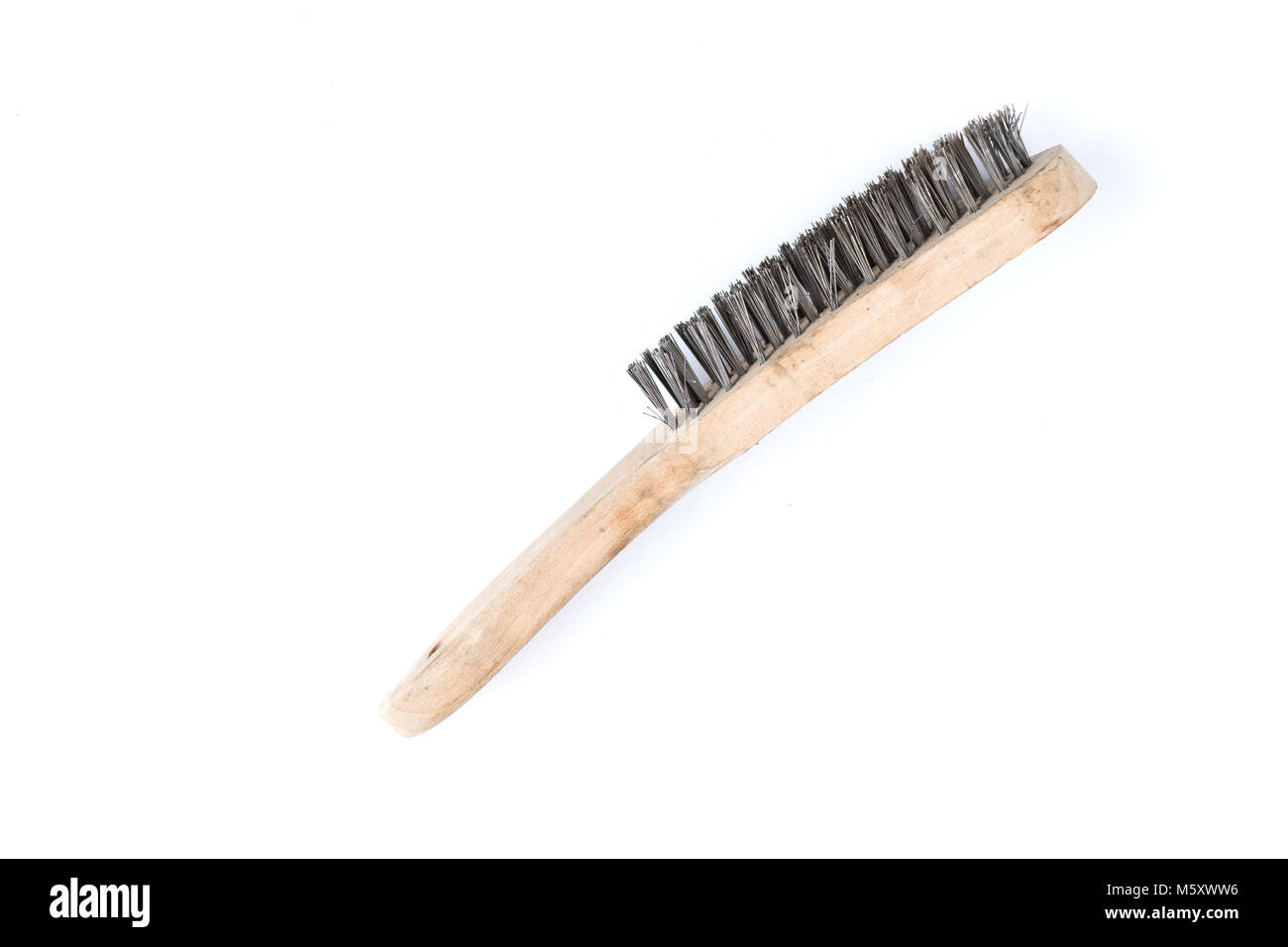 Brosse en bois isolé sur un fond blanc. Strong brosse pour l'enlèvement de la rouille. Brosse métallique industrielle. Banque D'Images